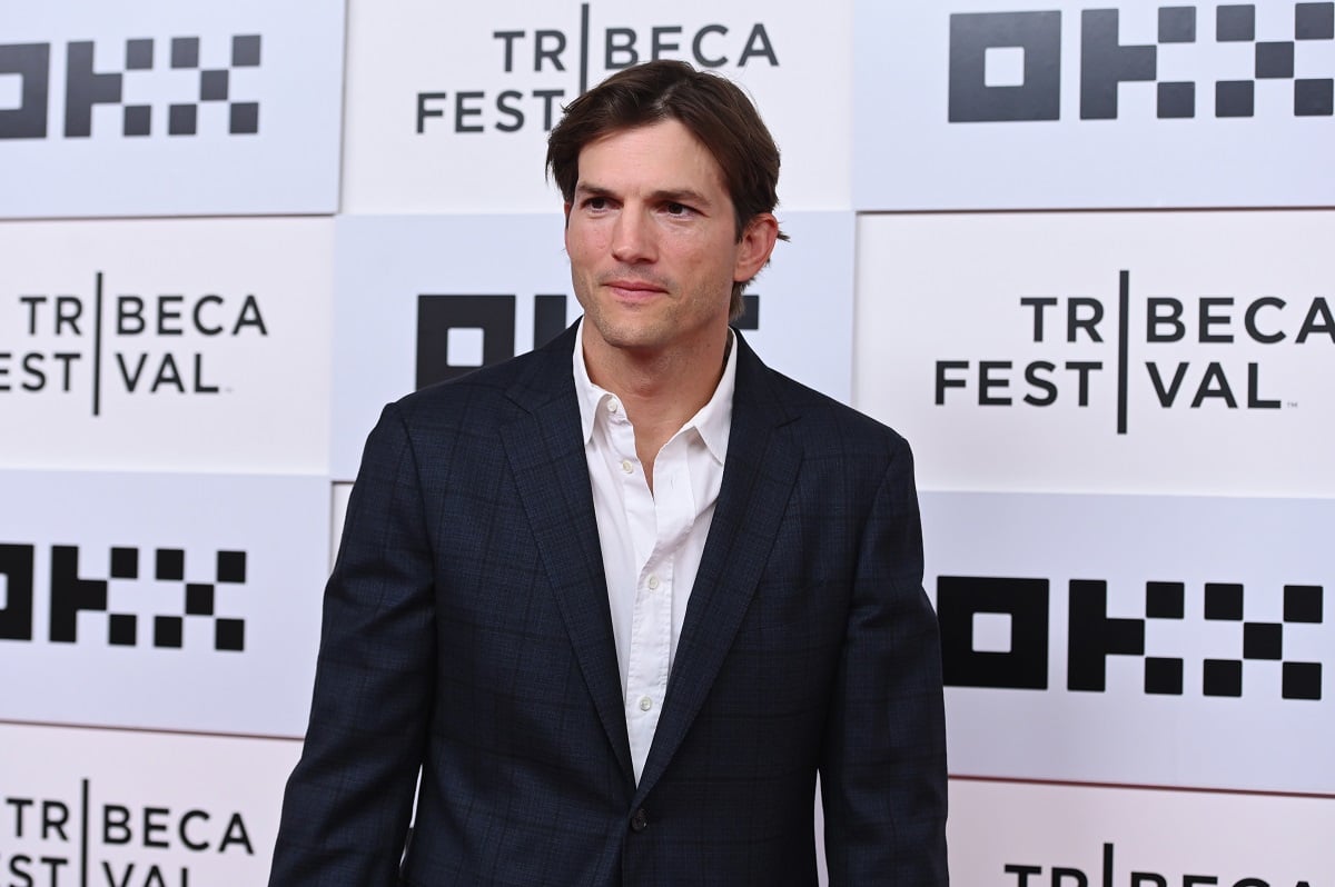 Ashton Kutcher posing at the 'Vengeance' premiere.