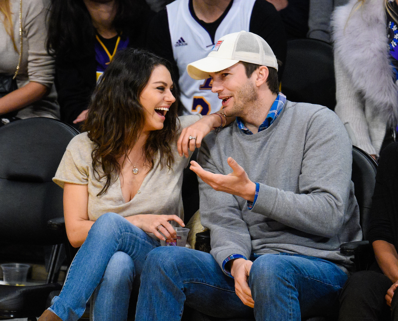 Mila Kunis and Ashton Kutcher pictured at a basketball game between the Oklahoma City Thunder and the Los Angeles Lakers at Staples Center on December 19, 2014, in Los Angeles, California.