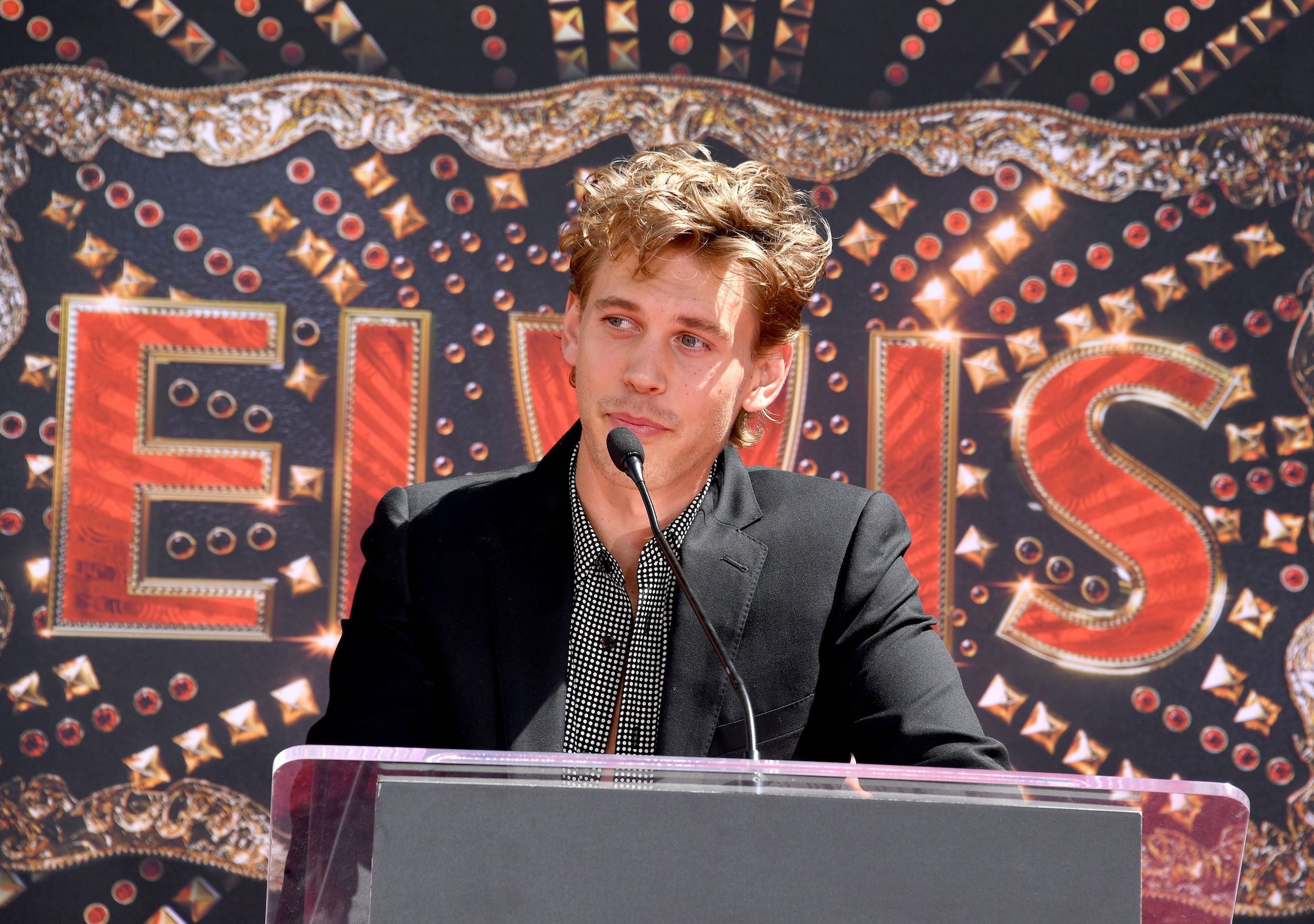 Austin Butler speaks at the handprint ceremony honoring Priscilla Presley, Lisa Marie Presley, and Riley Keough at TCL Chinese Theatre in Los Angeles, California