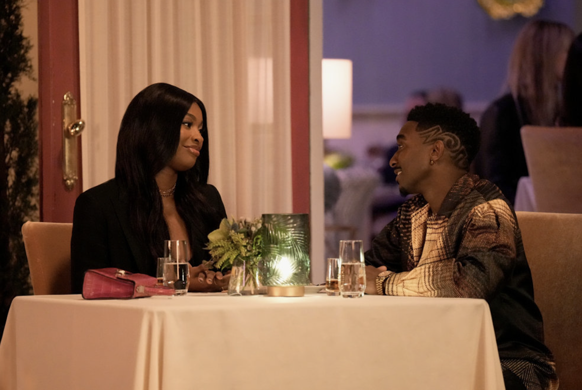 Coco Jones as Hilary Banks and Jordan L. Jones as Jazz on a romantic dinner date in 'Bel-Air'