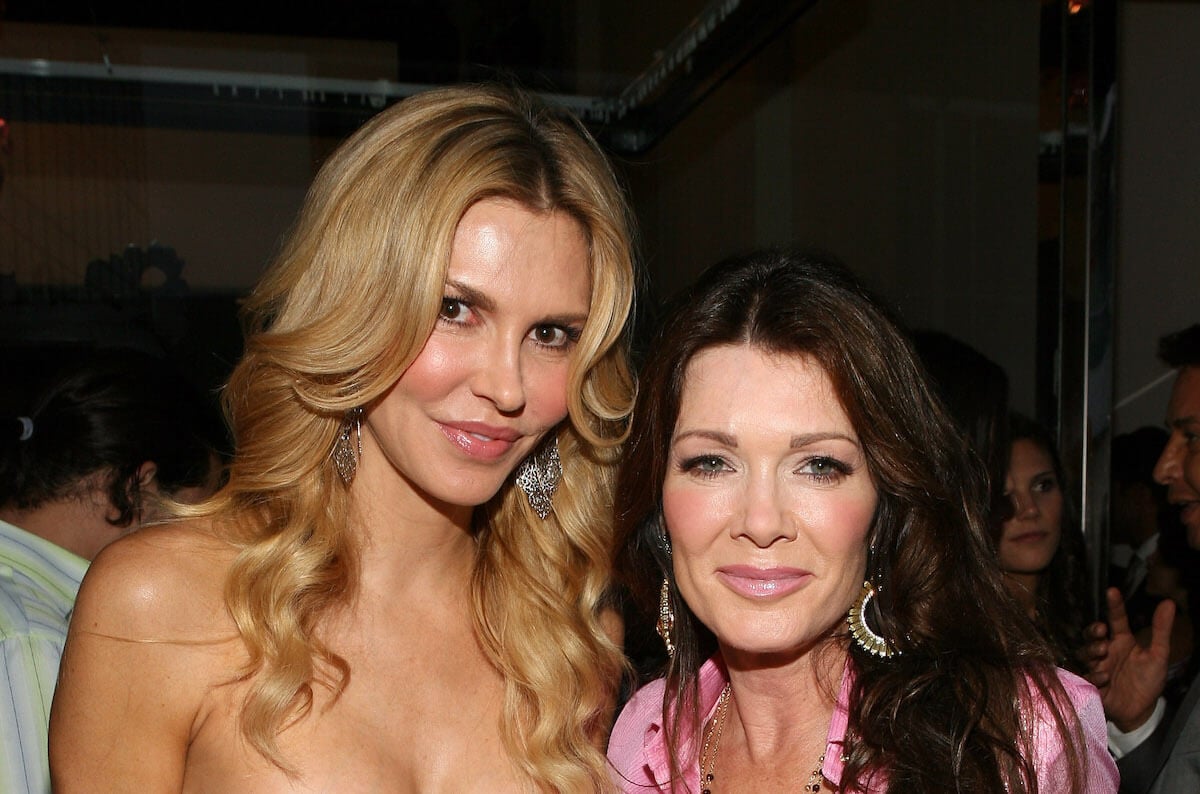 Brandi Glanville and Lisa Vanderpump smiling for a photo together