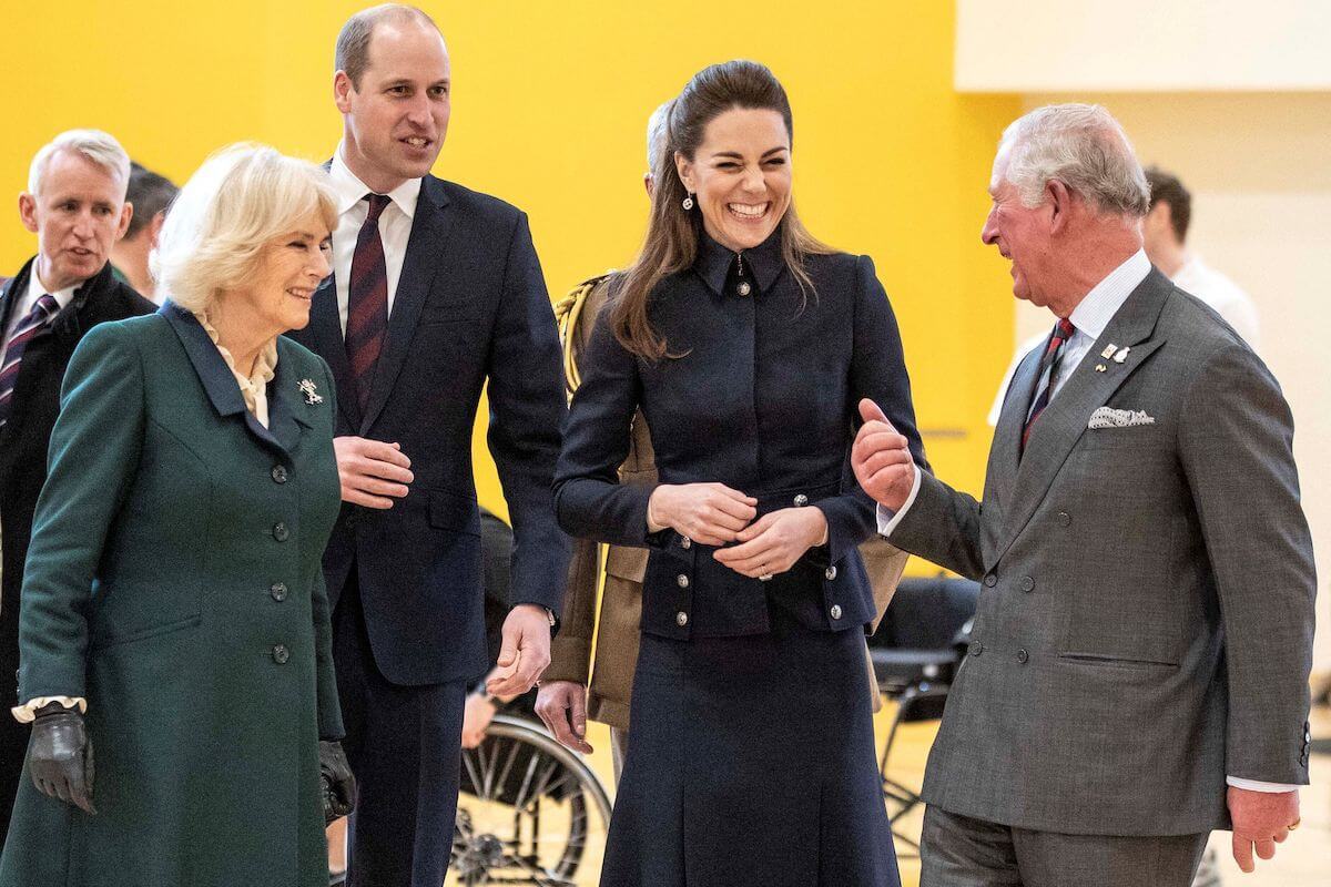 King Charles, whose schedule  'frustrated' Prince William and Camilla Parker Bowles, stands with Camilla Parker Bowles, Kate Middleton, and Prince William.