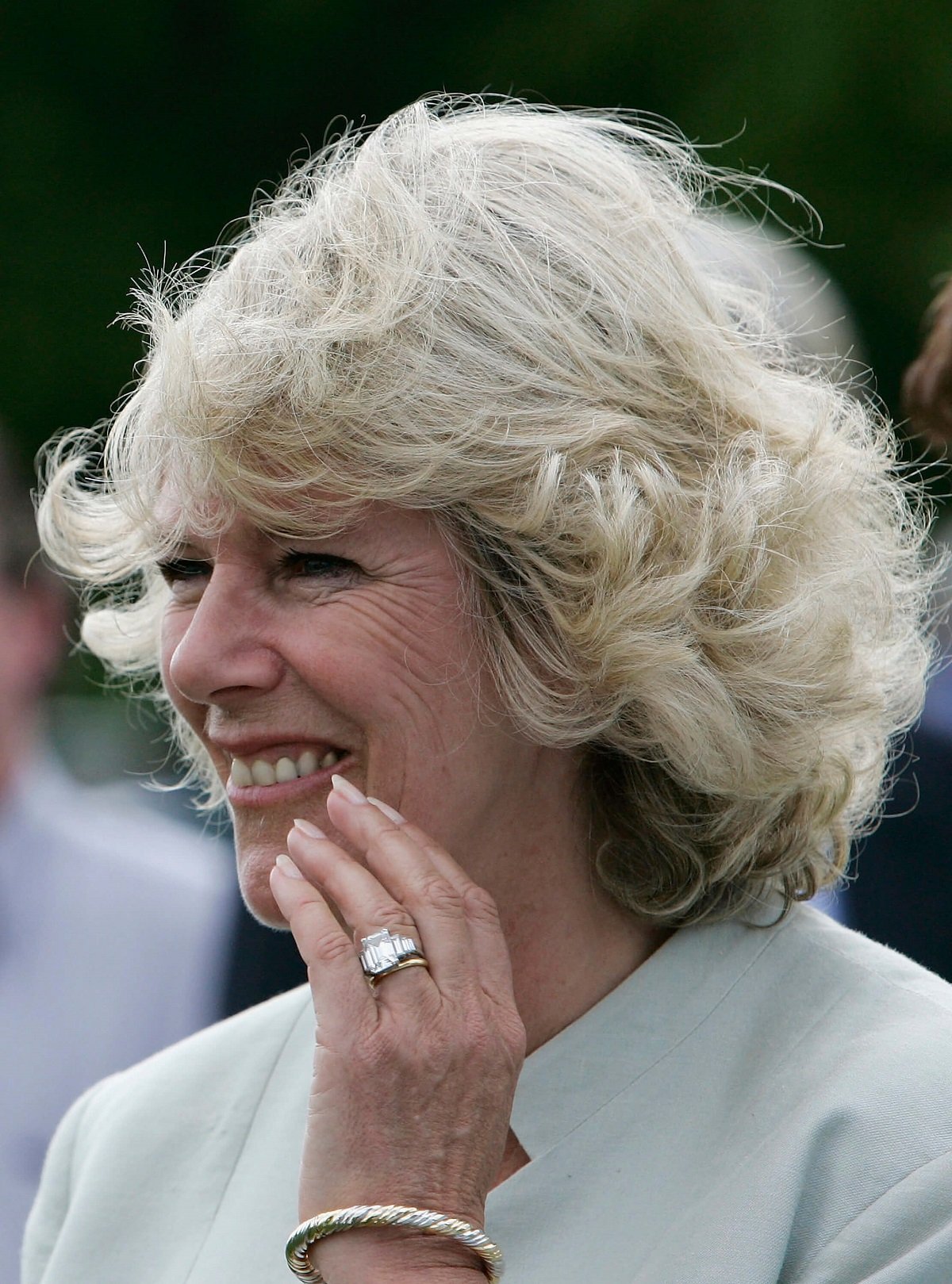 Camilla Parker Bowles' engagement ring is seen on her finger at a polo match in Cirencester, England