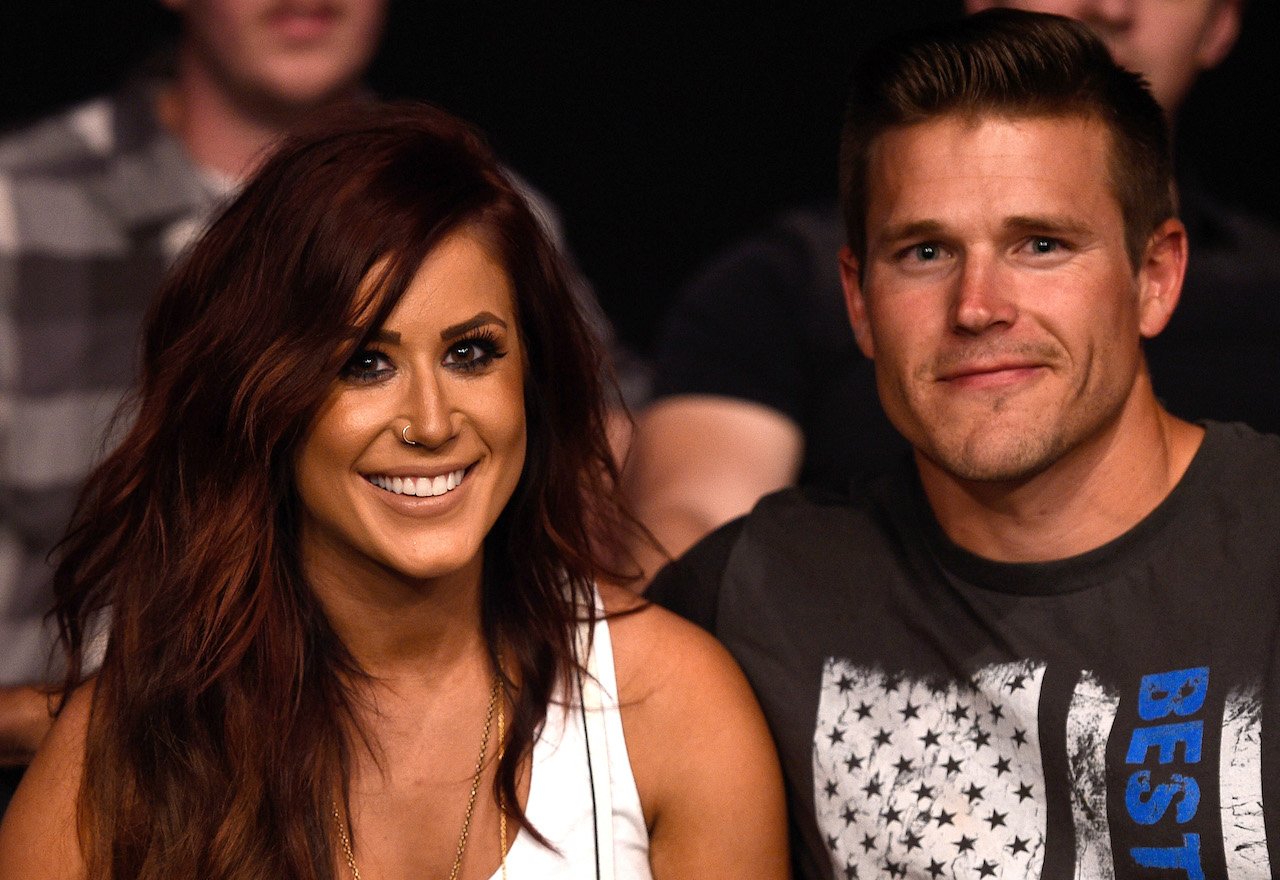 Chelsea Houska DeBoer and Cole DeBoer watch the fights during the UFC Fight Night event on July 13, 2016.