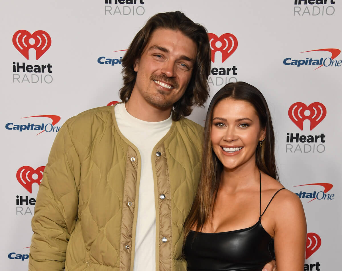 "Bachelor in Paradise" stars Dean Unglert and Caelynn Miller-Keyes pose together at an event.
