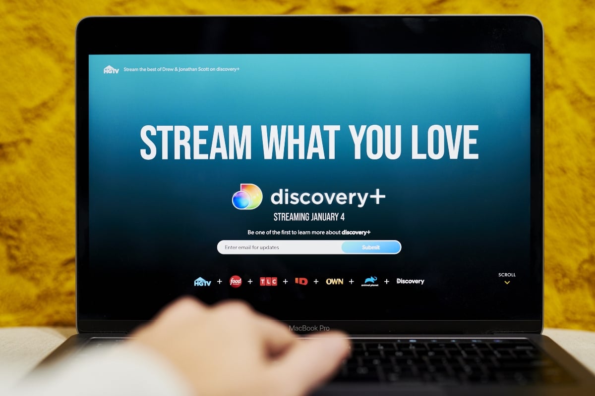The Discovery+ website home screen on a laptop computer arranged in the Brooklyn borough of New York, U.S., on Thursday, Dec. 31, 2020. Discovery+ will launch in the U.S. on January 4 for $5 a month with commercials and $7 a month ad free, making it the latest traditional media company to rev up a rival to Netflix and Disney Plus.
