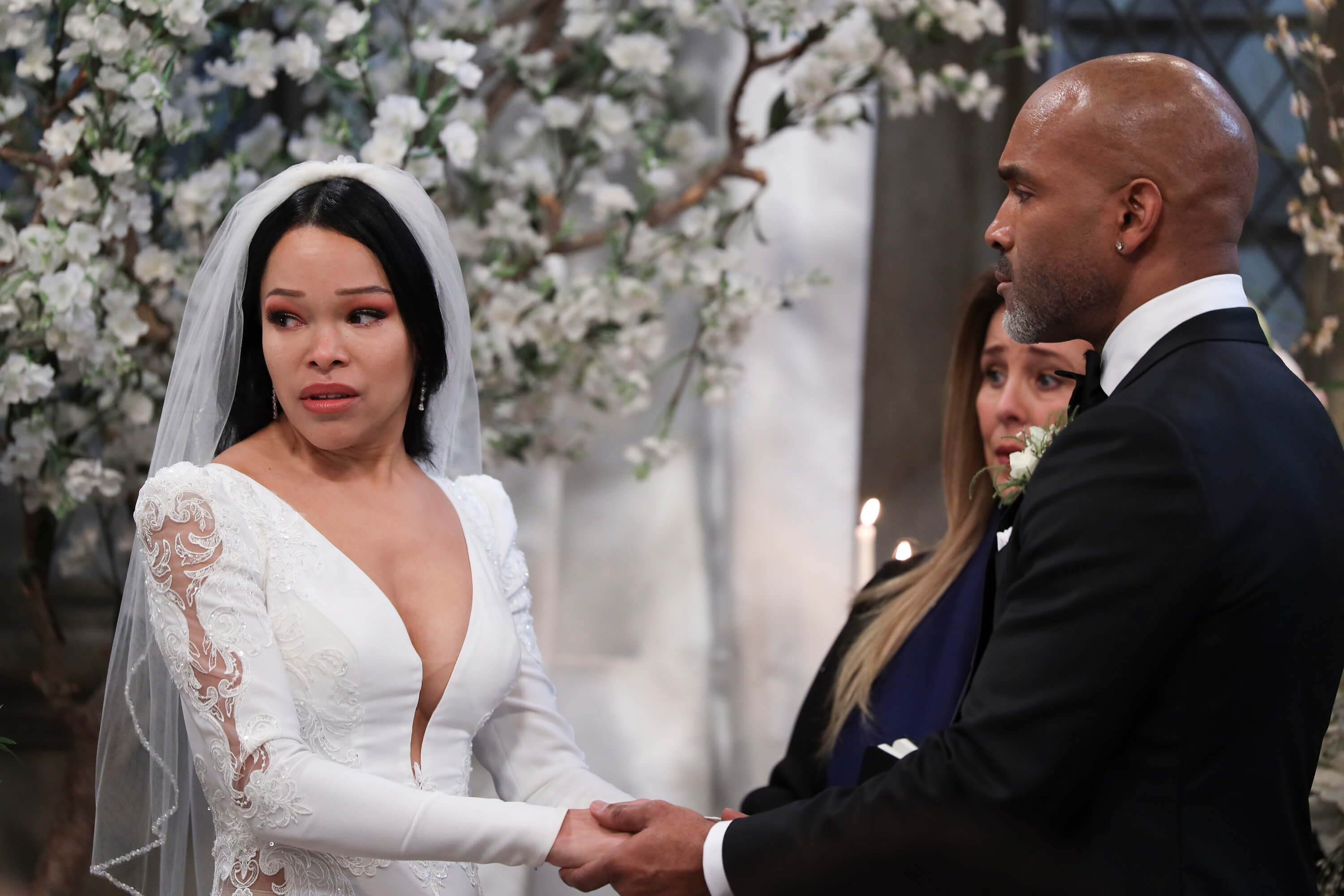 'General Hospital' stars Brook Kerr and Donnell Turner in a scene from Portia Robinson and Curtis Ashford's wedding.