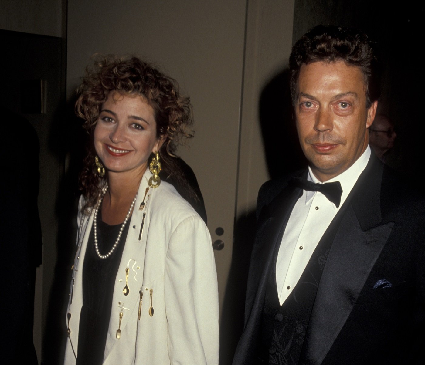 Annie Potts and Tim Curry attend an awards ceremony together in 1991