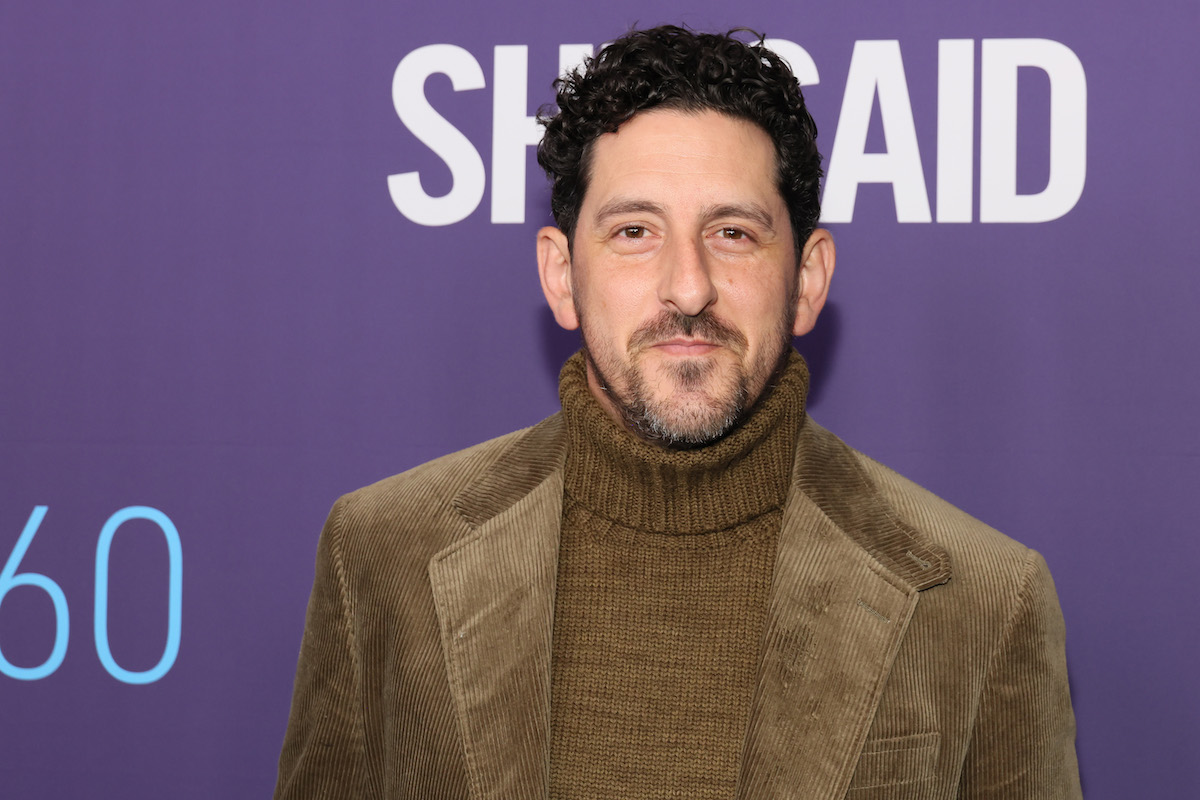'Gilmore Girls' guest star Adam Shapiro stands on the red carpet