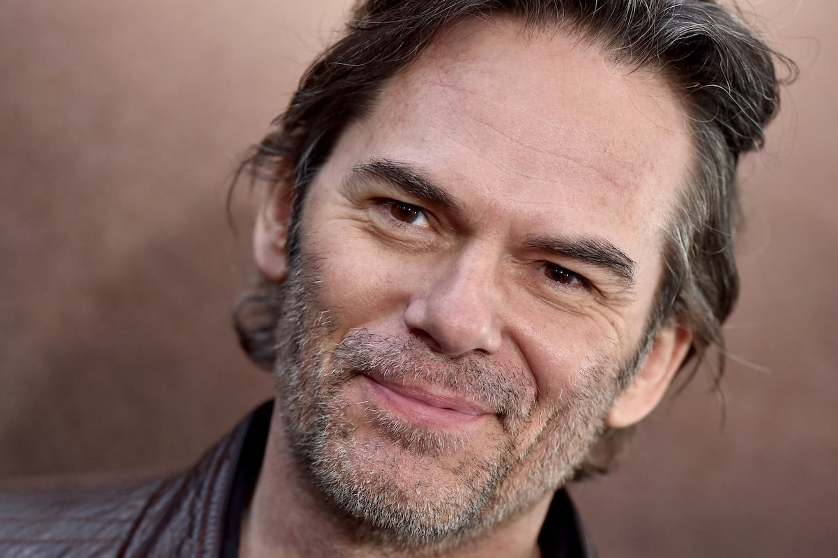 'Gilmore Girls' Alex Lesman actor Billy Burke smiles on a red carpet