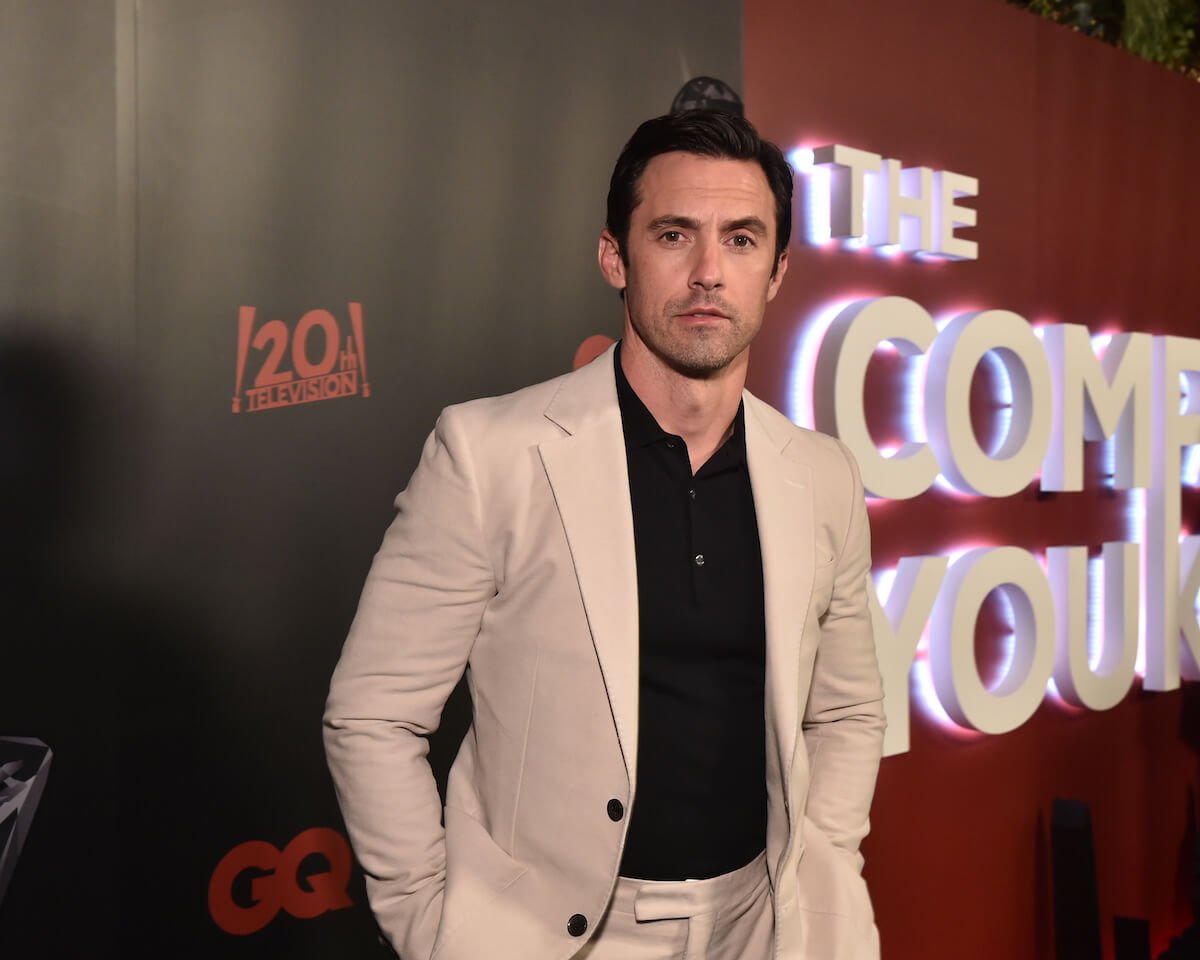 'Gilmore Girls' star Milo Ventimiglia poses in a suit on a red carpet