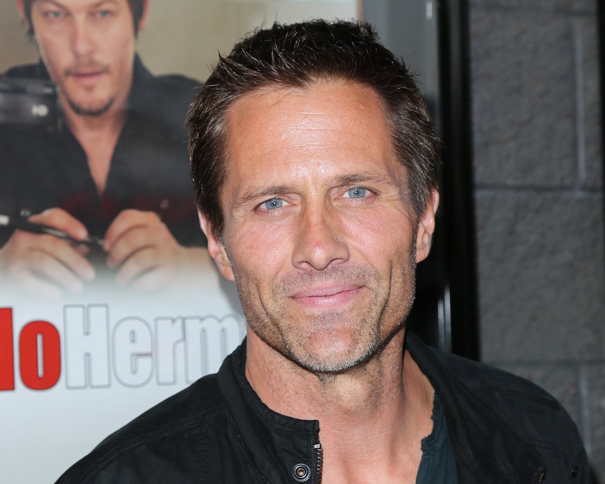 'Gilmore Girls' Guest Star Rob Estes smiles on a red carpet