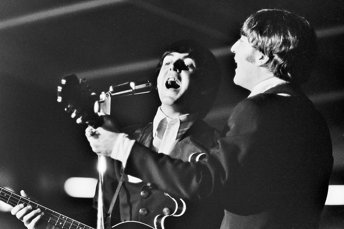 Paul McCartney and John Lennon of The Beatles performing in the U.S. in 1966.