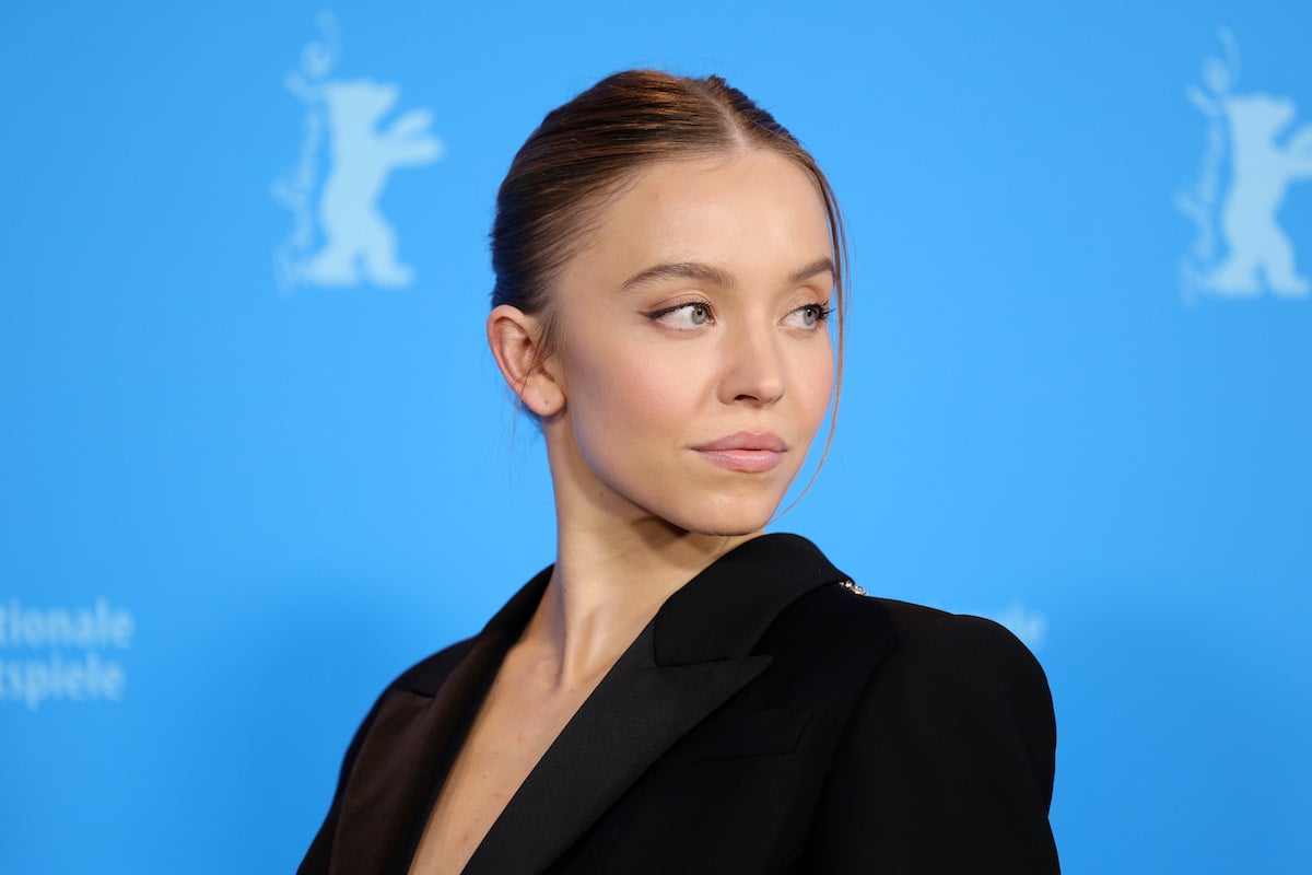 Graveyard music video star Sydney Sweeney in a black cutout suit