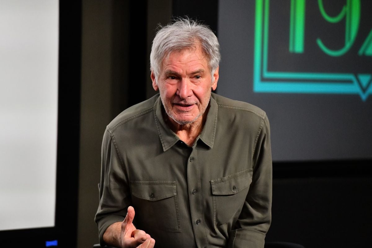 Harrison Ford answers questions about "1923" at an event.