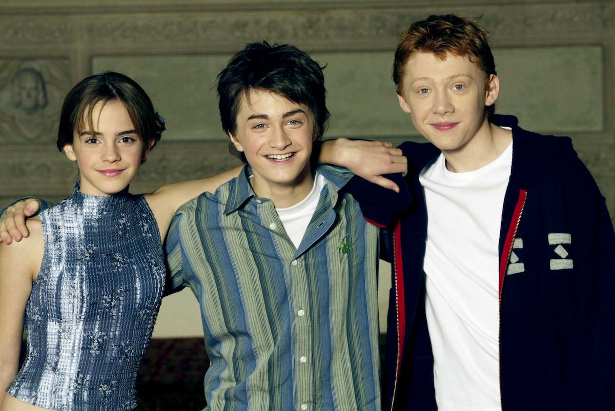 Actors Emma Watson, Daniel Radcliffe and Rupert Grint attend a photocall for the movie "Harry Potter and the Chamber of Secrets" in 2002