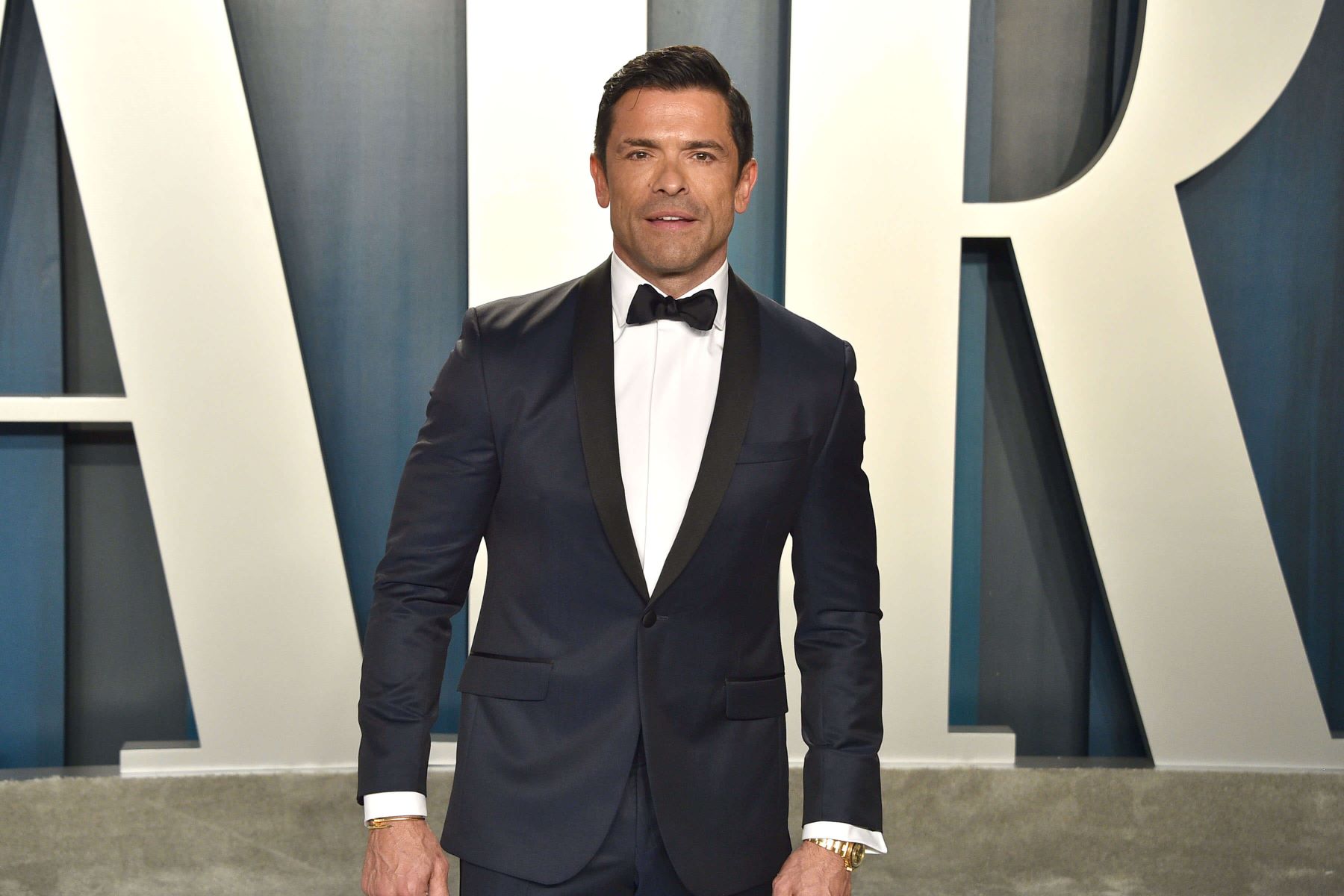 Mark Consuelos, who appears in 'How I Met Your Father' Season 2, wears a dark blue tux