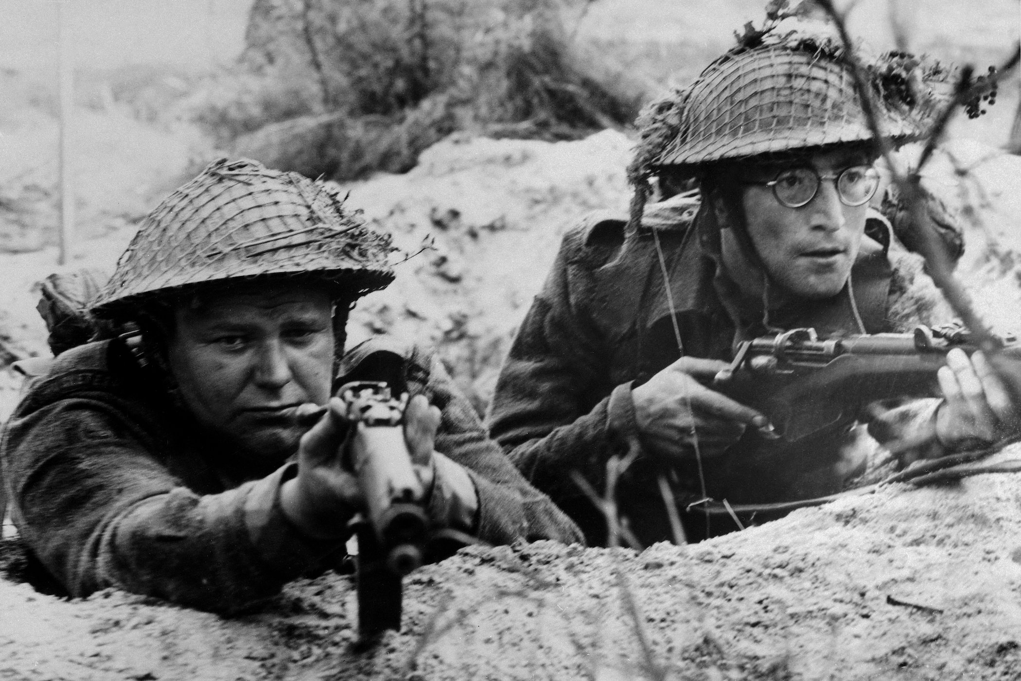 Beatle John Lennon (right) and Roy Kinnear play members of a British Platoon caught up in World War II's north Africa campaign, 'How I Won the War'