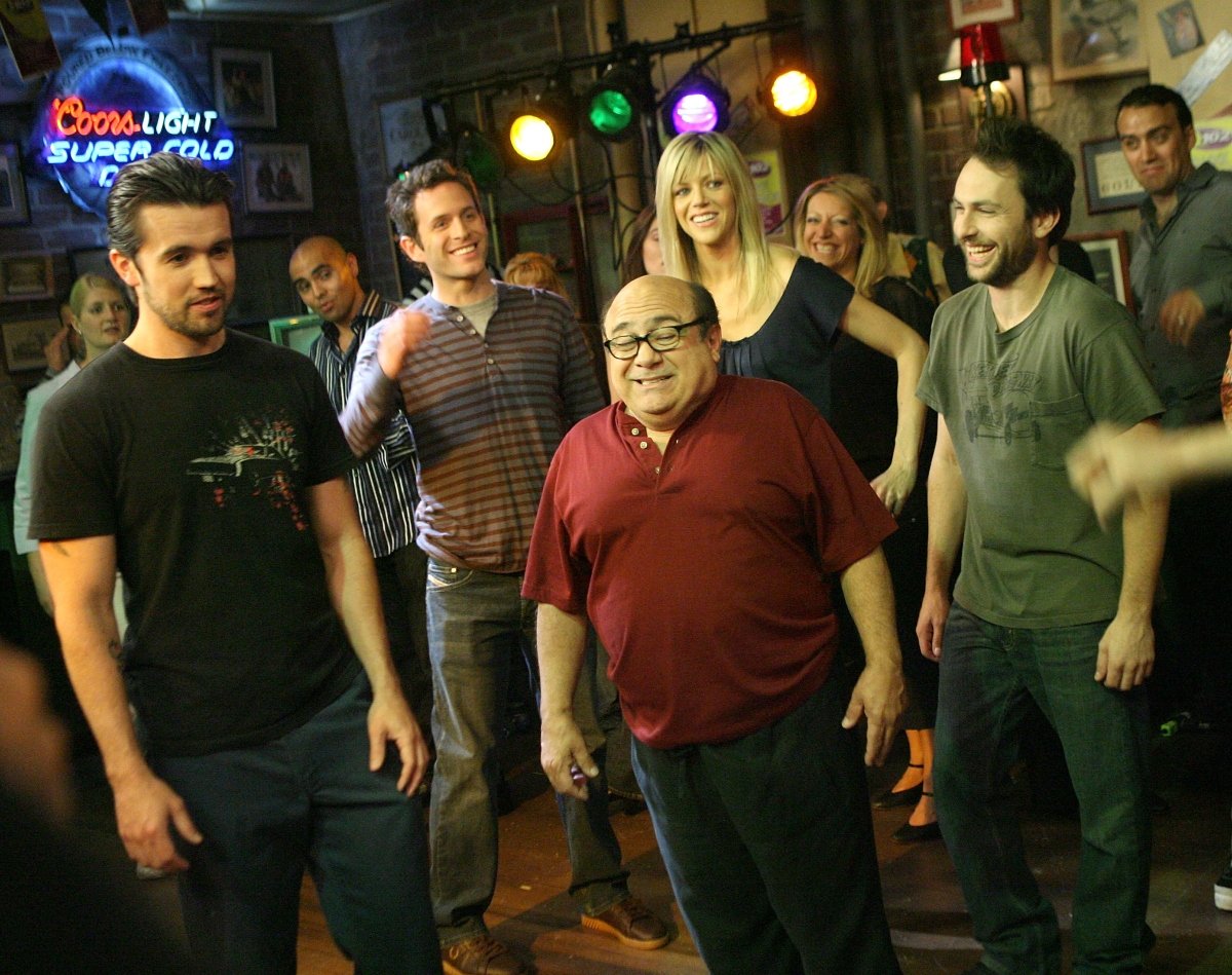 Actors Rob McElhenney, Glenn Howerton, Kaitlin Olson, Danny DeVito and Charlie Day act during a dance scene on the set of 'It's Always Sunny In Philadelphia' on May 23, 2007 in Los Angeles, California.