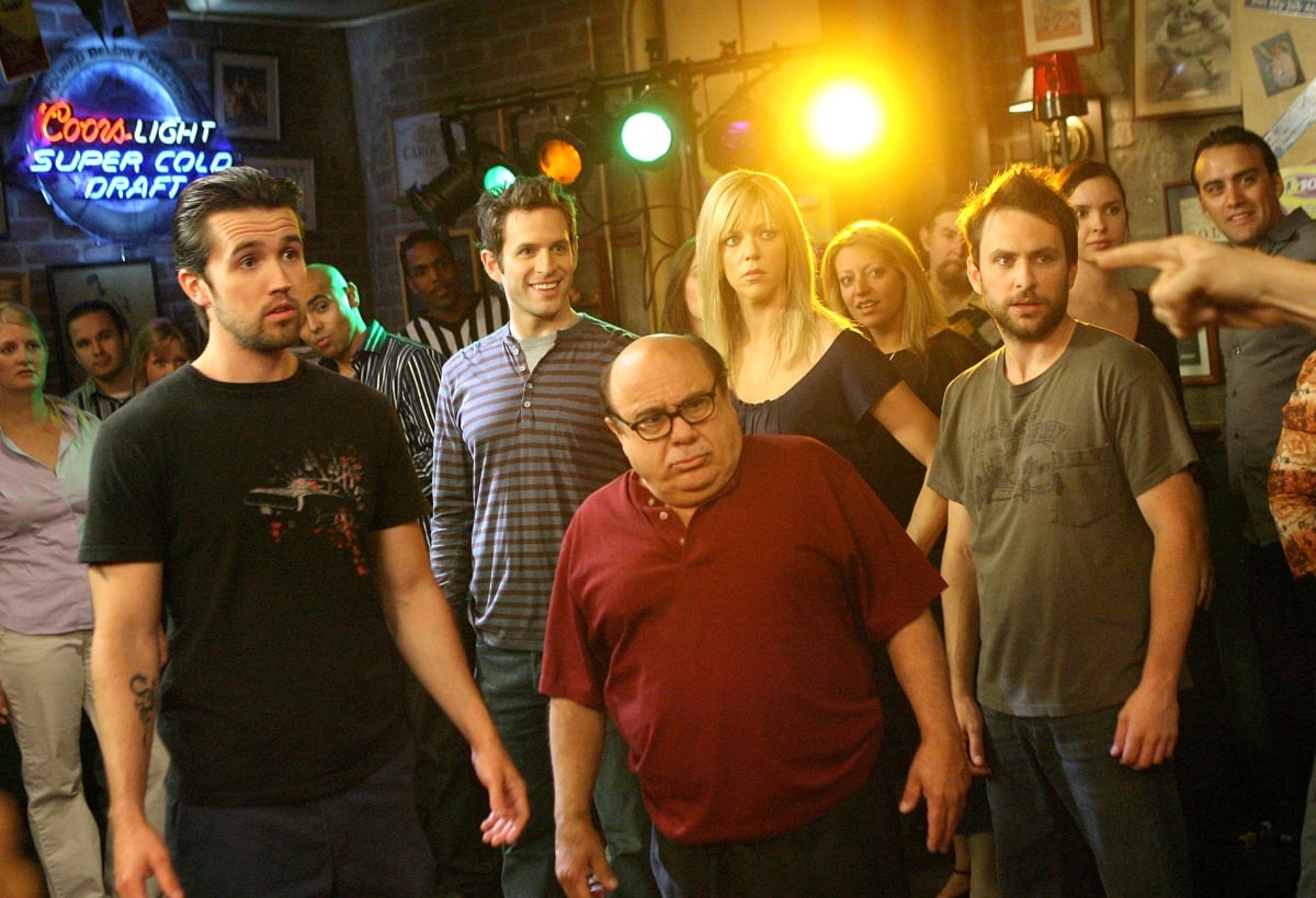 Actors Rob McElhenney, Glenn Howerton, Kaitlin Olson, Danny DeVito and Charlie Day act during a dance scene on the set of 'It's Always Sunny In Philadelphia' on May 23, 2007 in Los Angeles, California.