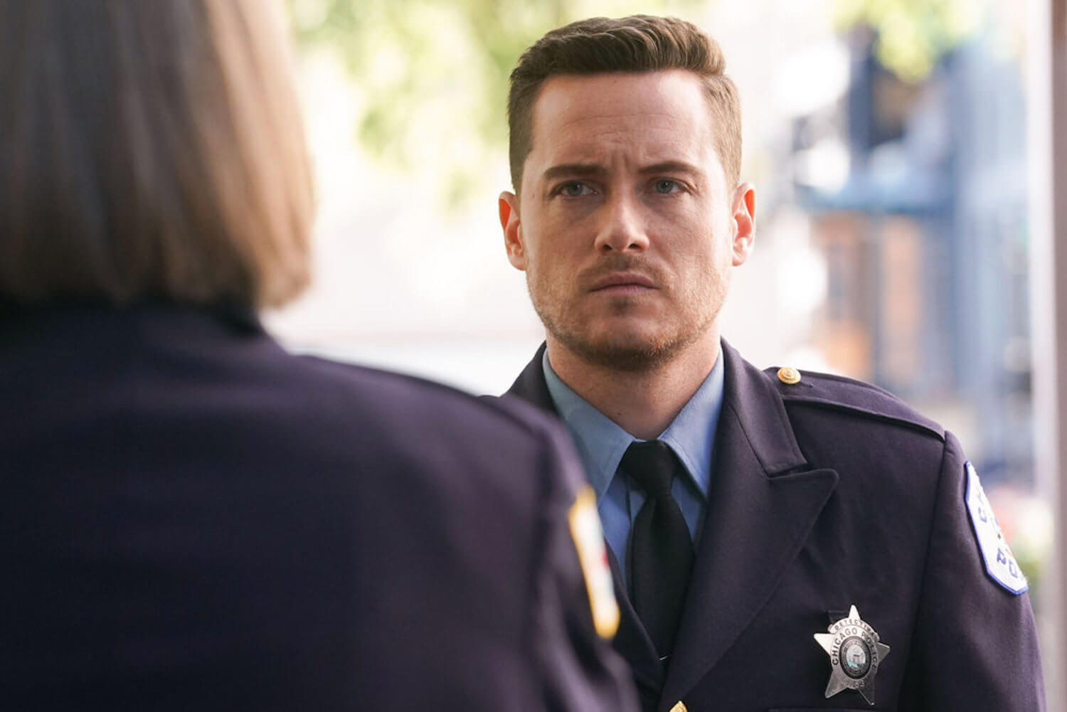 Jay Halstead actor Jesse Lee Soffer dressed in a suit in 'Chicago P.D.'