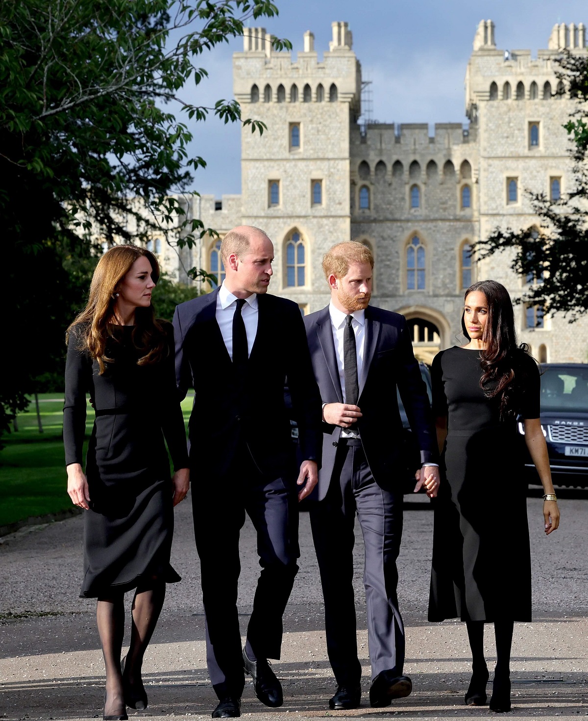 Kate Middleton, Prince William, Prince Harry, and Meghan Markle arrive at Windsor to view flowers and tributes to Queen Elizabeth II