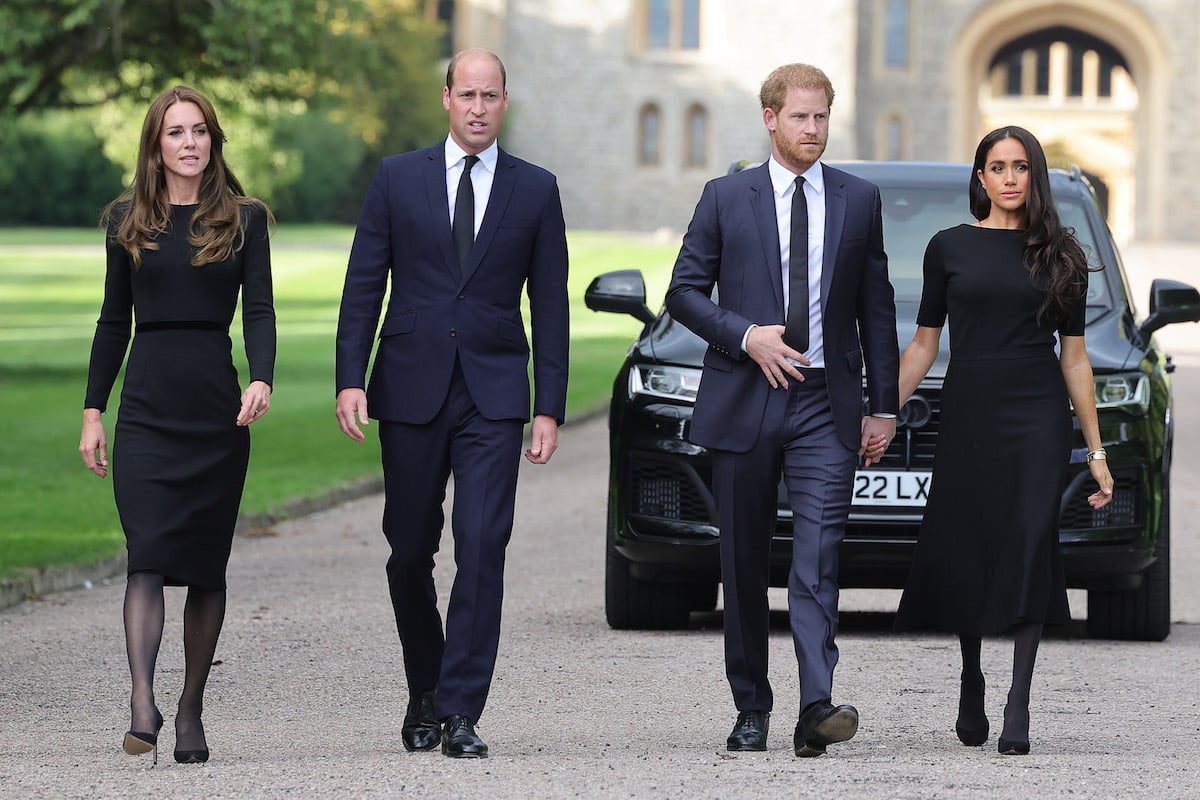 Meghan Markle, who 'completely freaked' Prince William 'out' when they met, according to Prince Harry's 'Spare', walks with Kate Middleton, Prince William, and Prince Harry