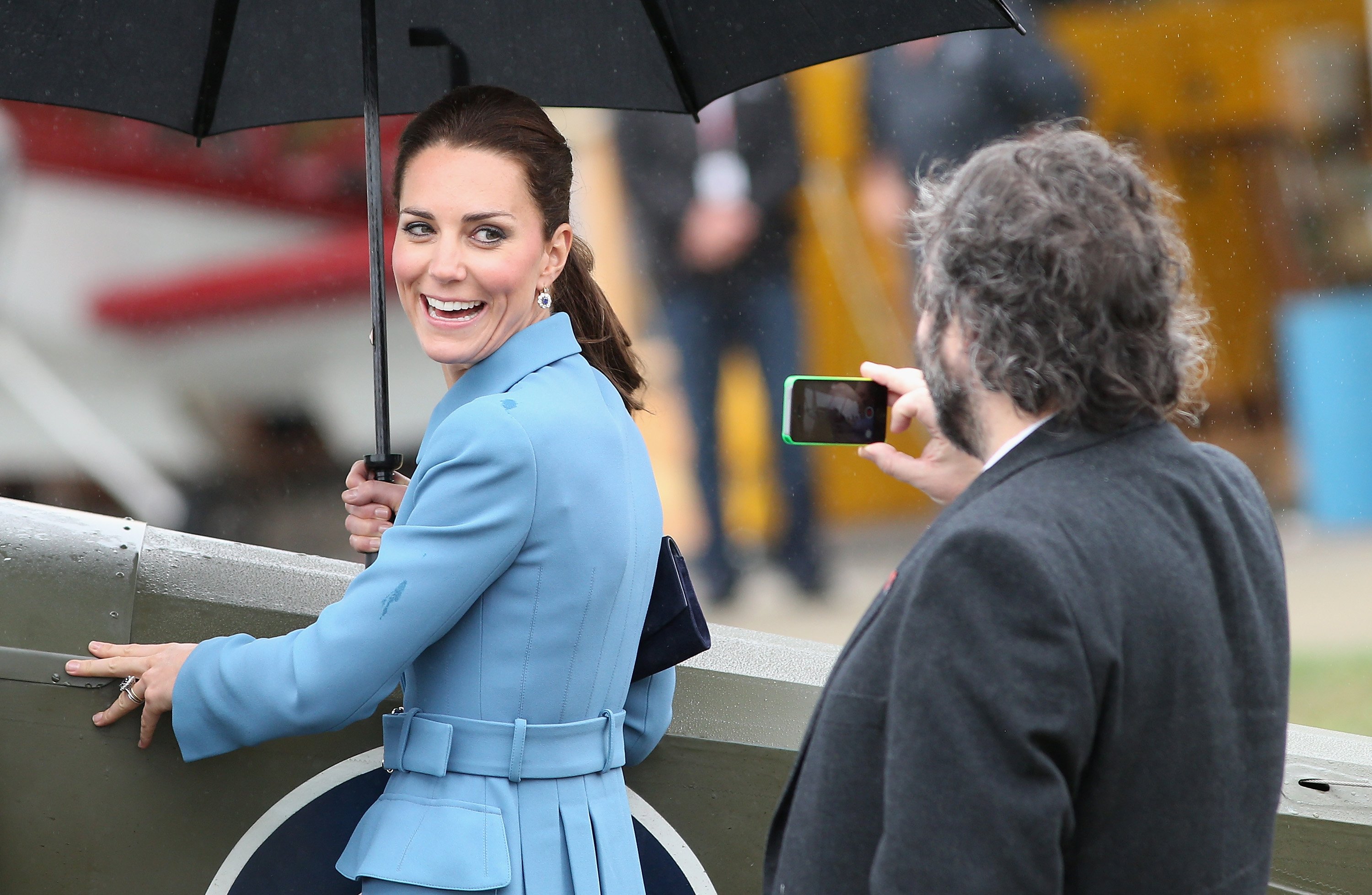 Kate Middleton, who started a new Instagram for The Royal Foundation Centre for Early Childhood, smiles getting her photo taken