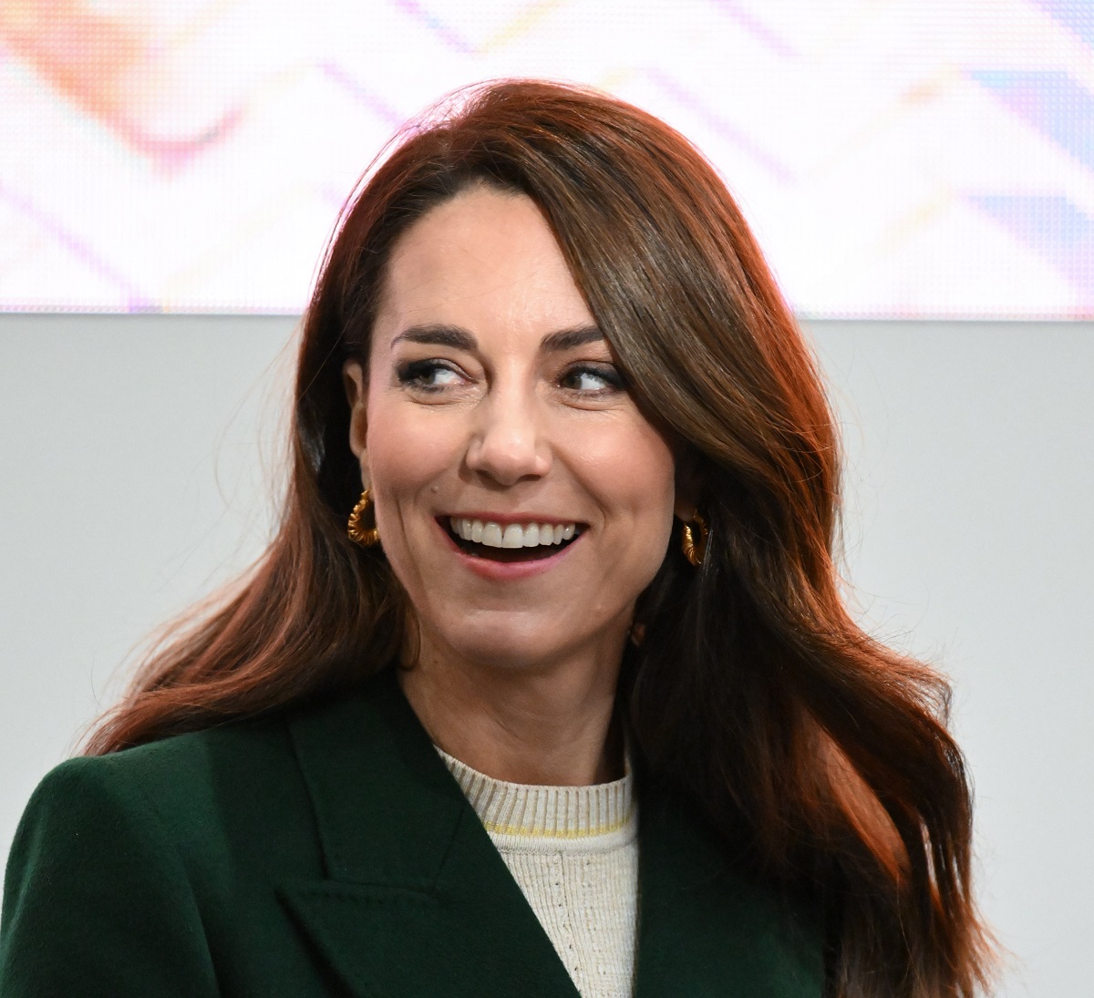 Kate Middleton, who made a bold move to "shake things up" with her staff, smiles during a visit to Kirkgate Market in Leeds, England