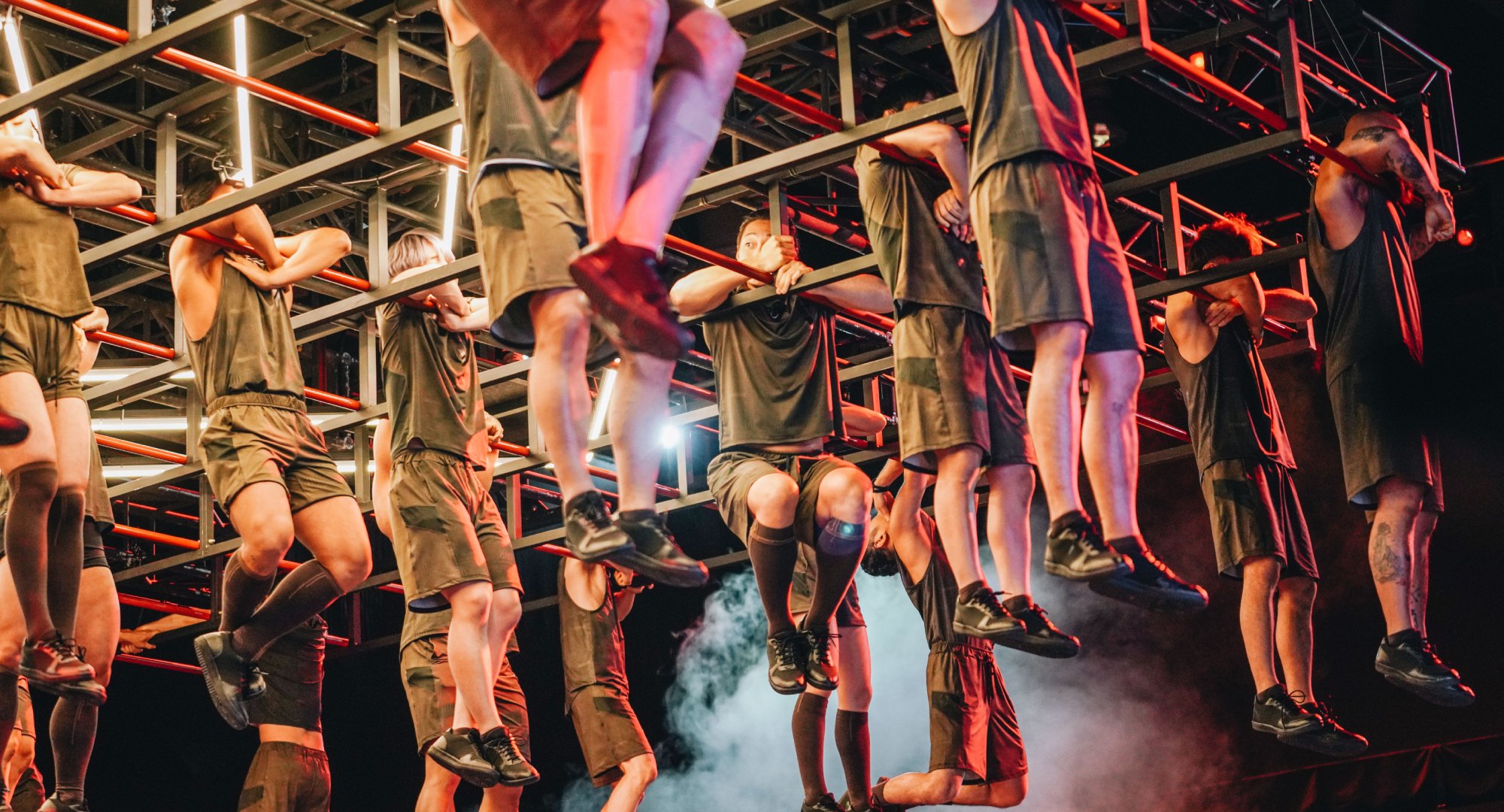 Kim Min-chae and the contestants during hanging challenge on 'Physical 100.'