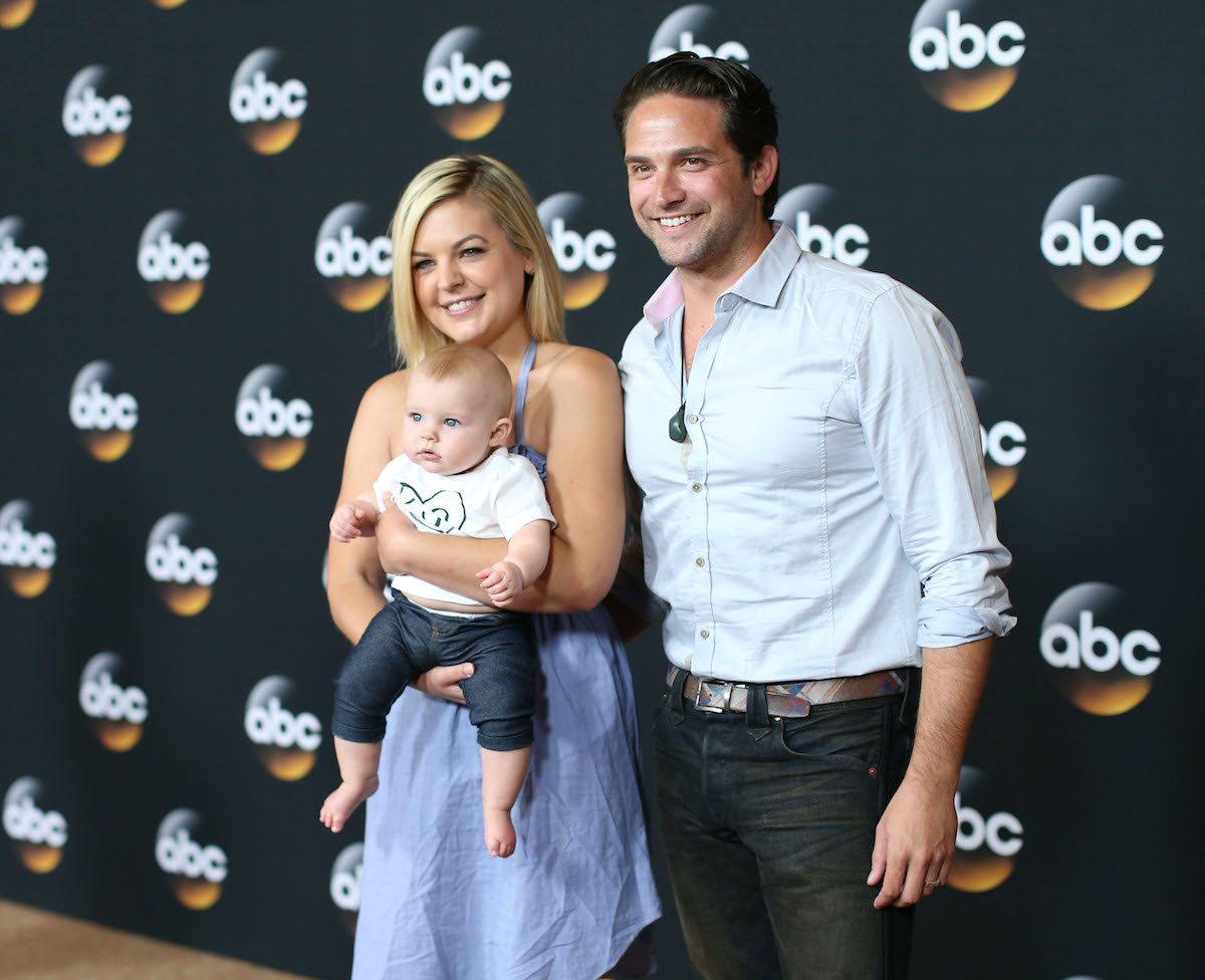 Kirsten Storms, Harper Rose Barash, and Brandon Barash smiling