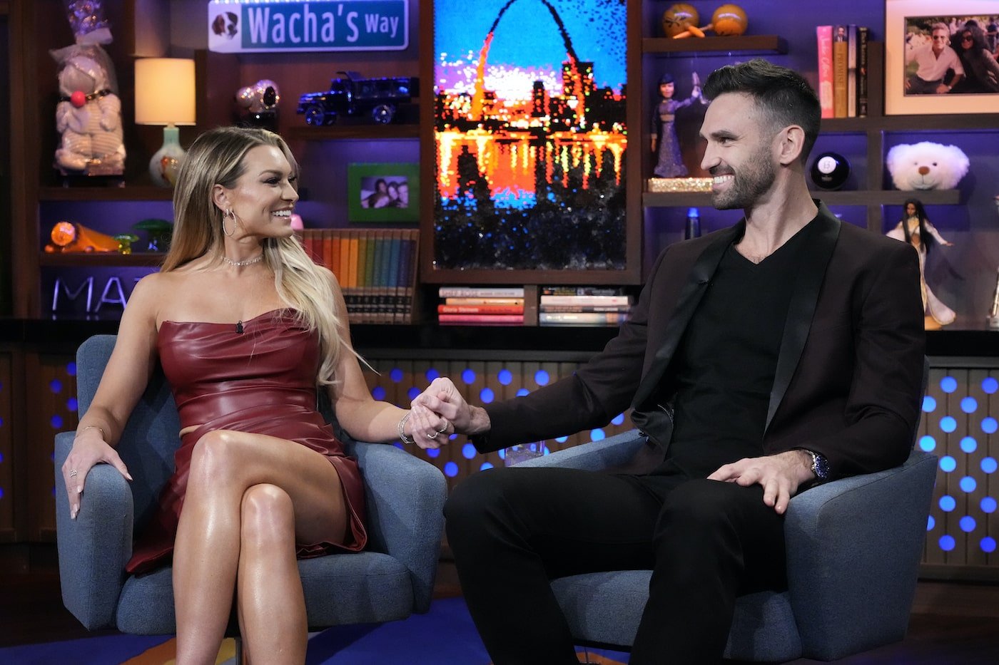 Lindsay Hubbard and Carl Radke from 'Summer House' hold hands and sit next to each other on 'WWHL.'