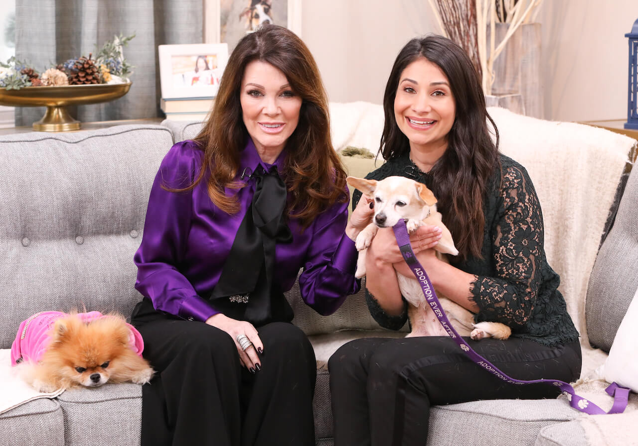 Lisa Vanderpump (L) and Pet Expert Larissa Wohl (R) pose with a rescue dog on the set of Hallmark Channel's "Home & Family" at Universal Studios Hollywood on January 14, 2020 in Universal City, California.