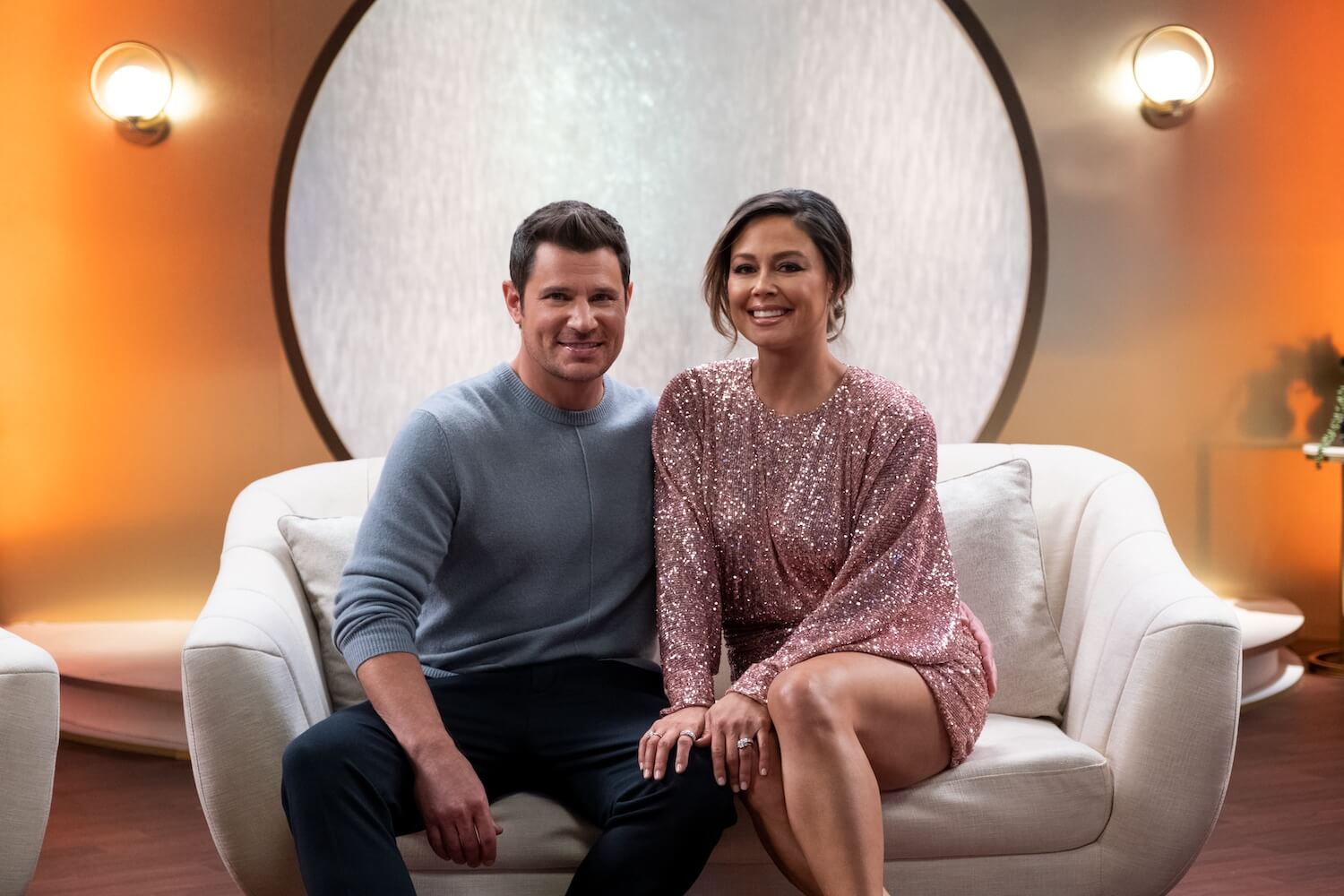 'Love Is Blind' Season 4 premieres on March 24. Nick and Vanessa Lachey host the series and are seen here sitting on a couch together during the season 2 reunion.