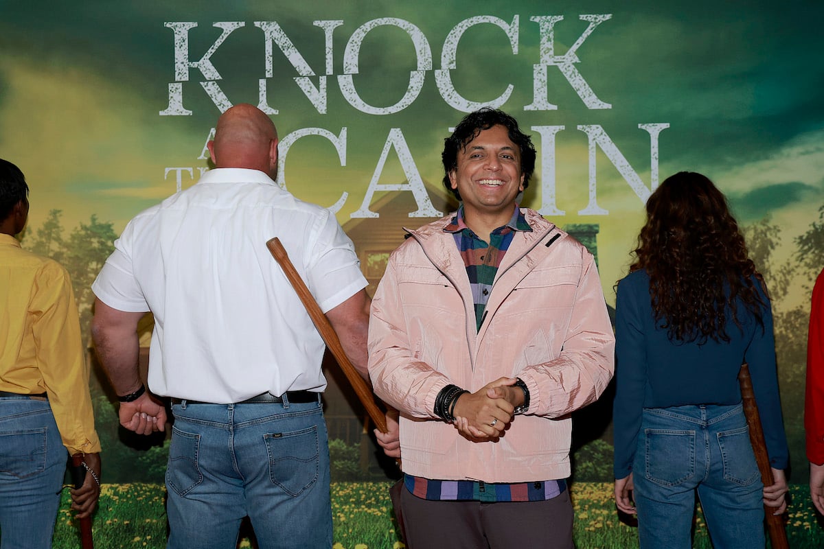 M. Night Shyamalan poses at a screening for "Knock At The Cabin"