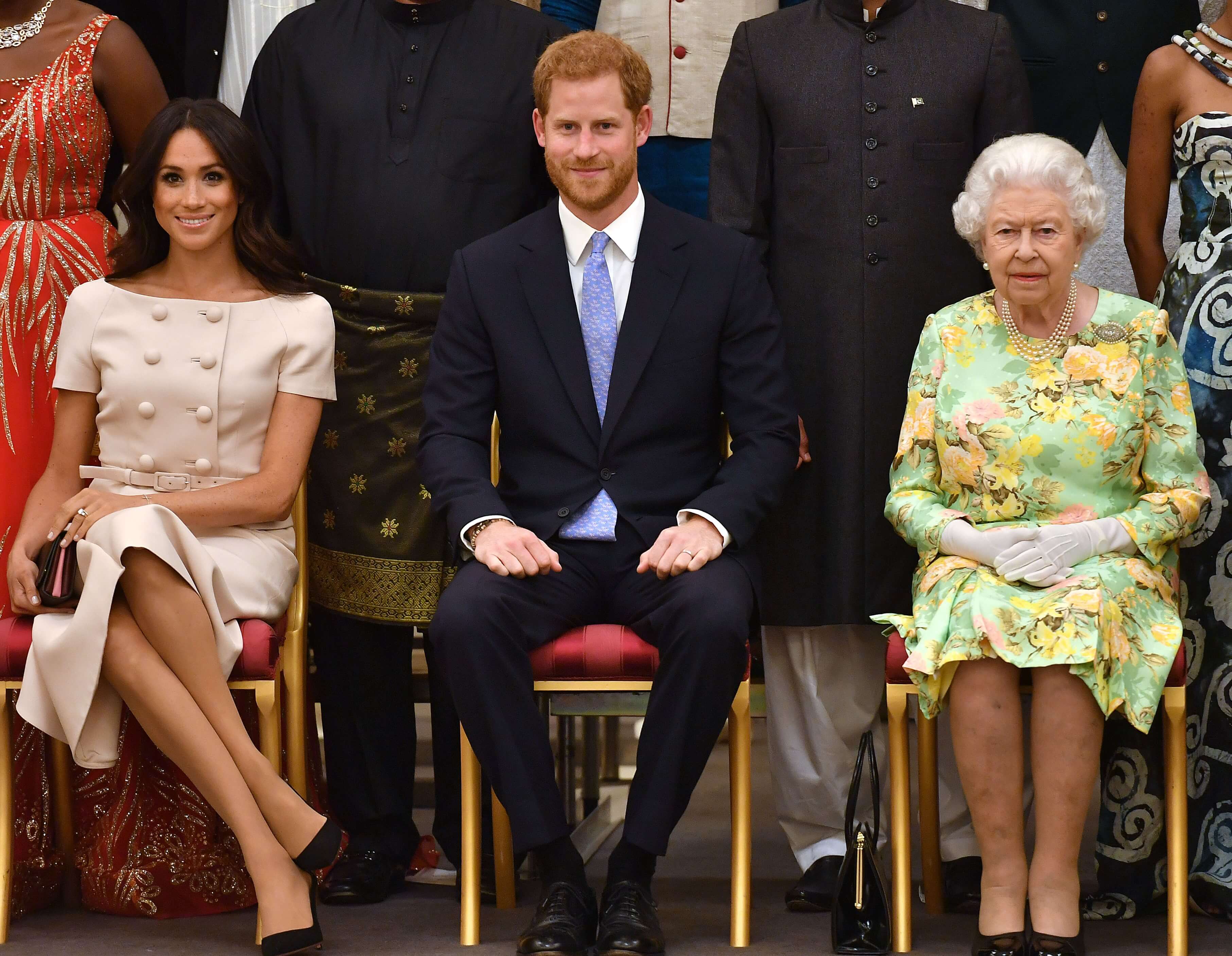 Meghan Markle, Prince Harry, and Queen Elizabeth II at the Queen's Young Leaders Awards Ceremony in 2018