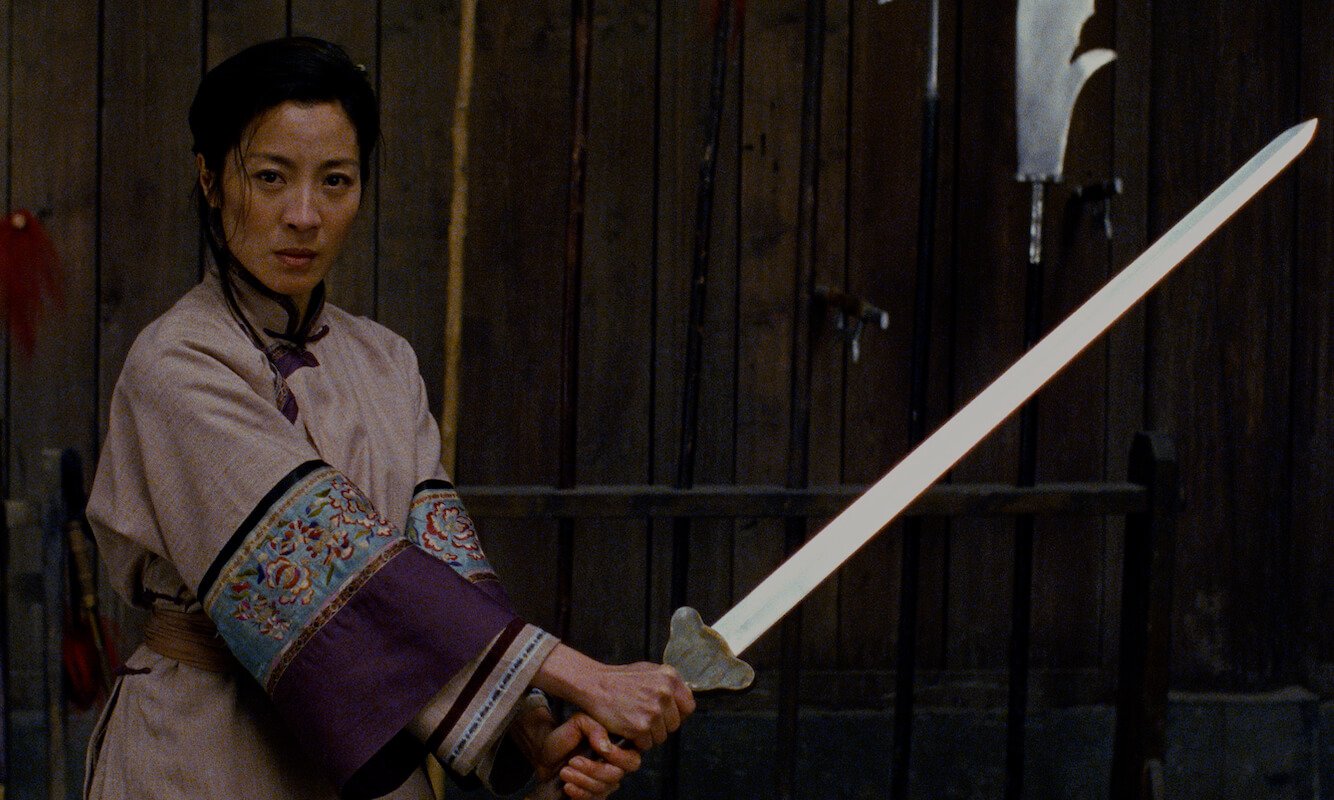 Michelle Yeoh holds a sword in the martial arts movie 'Crouching Tiger Hidden Dragon'
