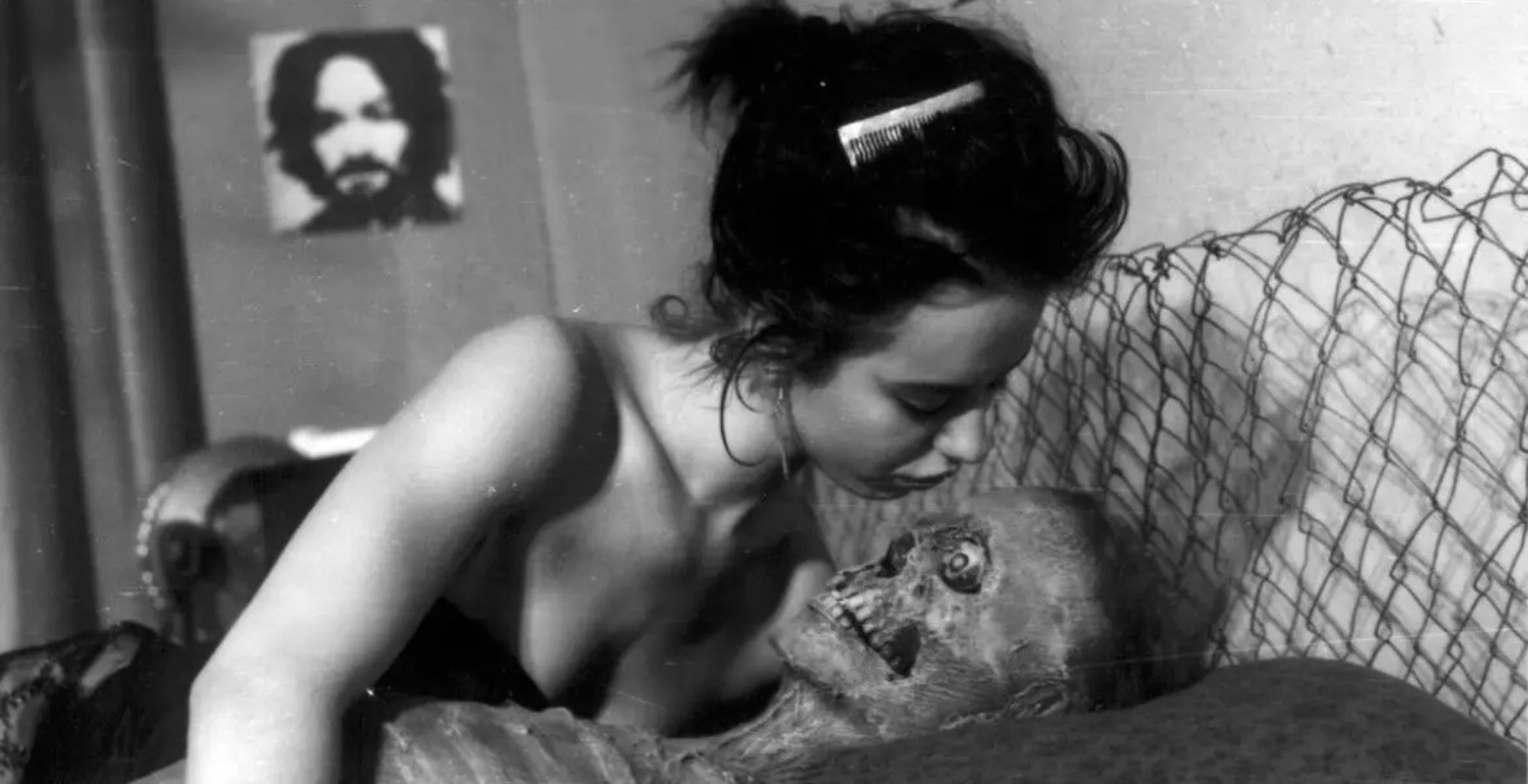 'Nekromantik' Beatrice Manowski as Betty leaning over a skeleton