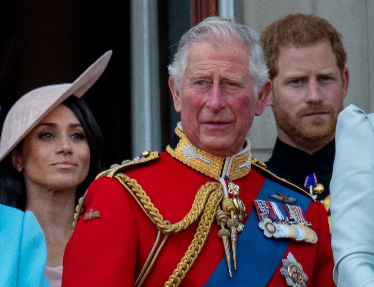 Now-King Charles III along with Prince Harry and Meghan Markle, who could became co-stars the monarch will share the spotlight with even of they don't attend coronation, standing on balcony during Trooping The Colour 2018