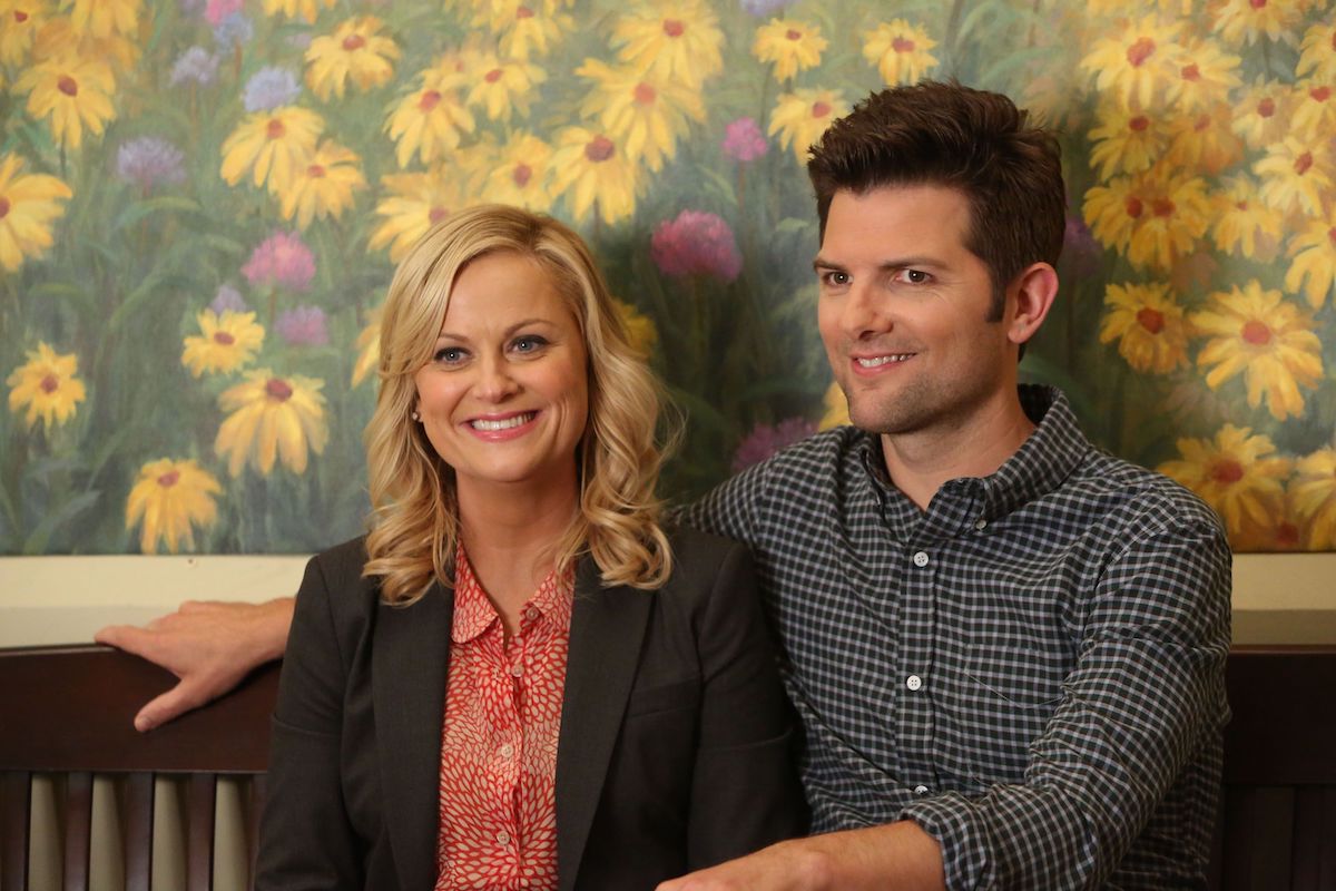 Amy Poehler as Leslie Knope and Adam Scott as Ben Wyatt film a scene for Parks and Recreation