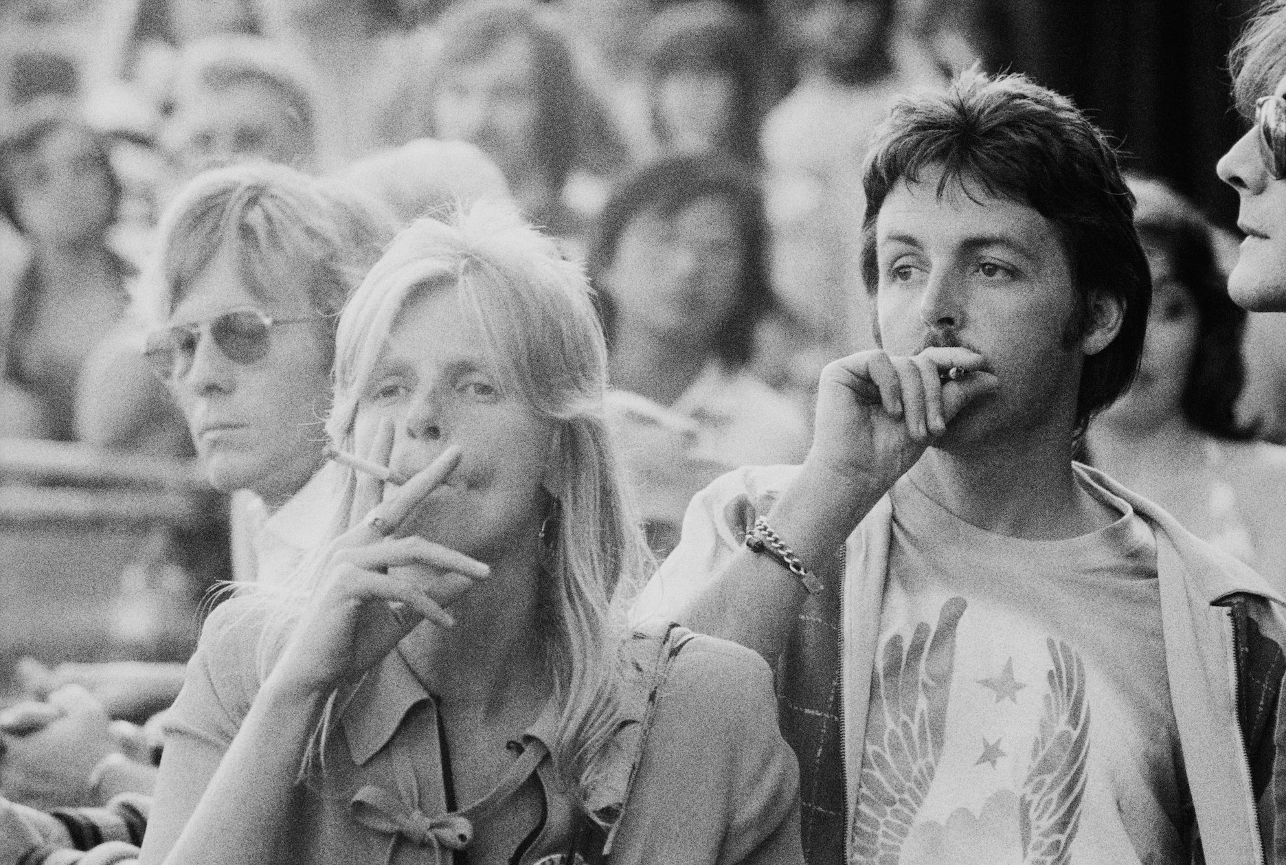 Linda and Paul McCartney attend the Knebworth Fair in Hertfordshire, England