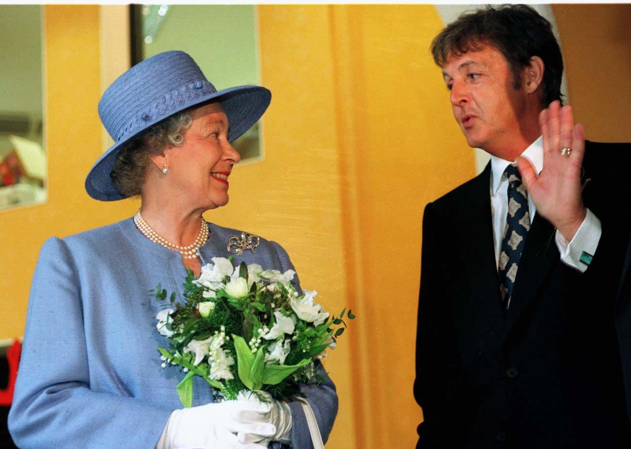 Paul McCartney and Queen Elizabeth II at the opening of the Liverpool Institute for Performing Arts.