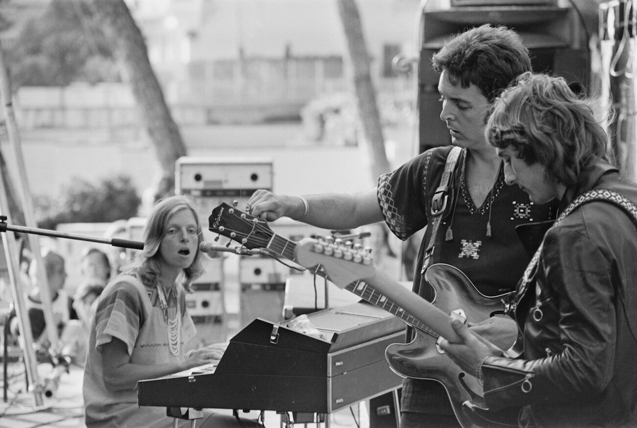 Paul McCartney, his wife Linda, and Denny Laine performing in 1972.