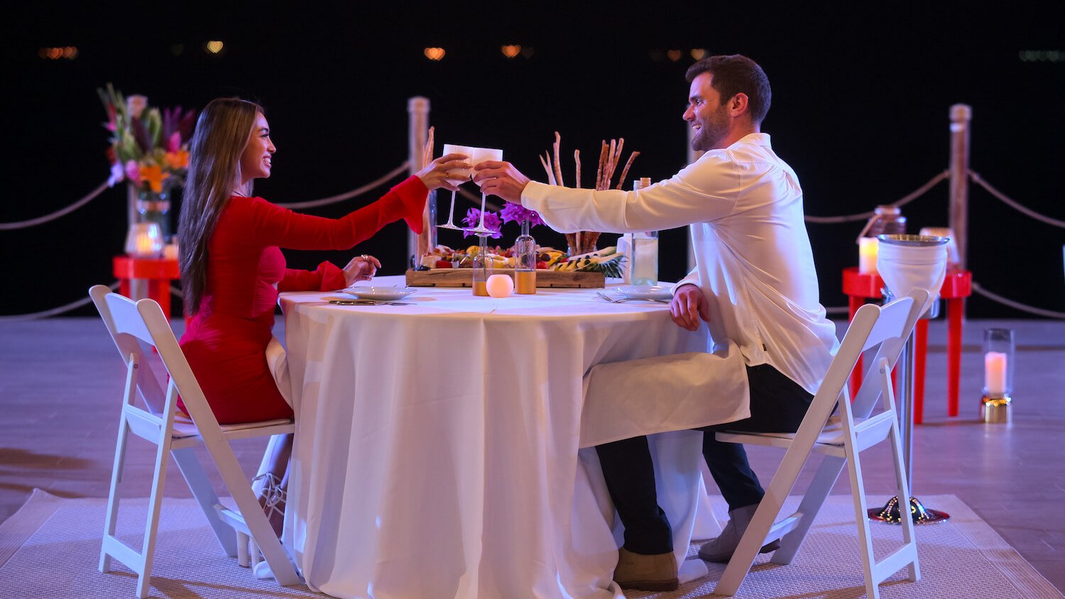 'Perfect Match' star Savannah says Francesca was actually the one in the relationship when arriving to film. Here Savannah wears a red dress and toasts with Nick after a challenge win.