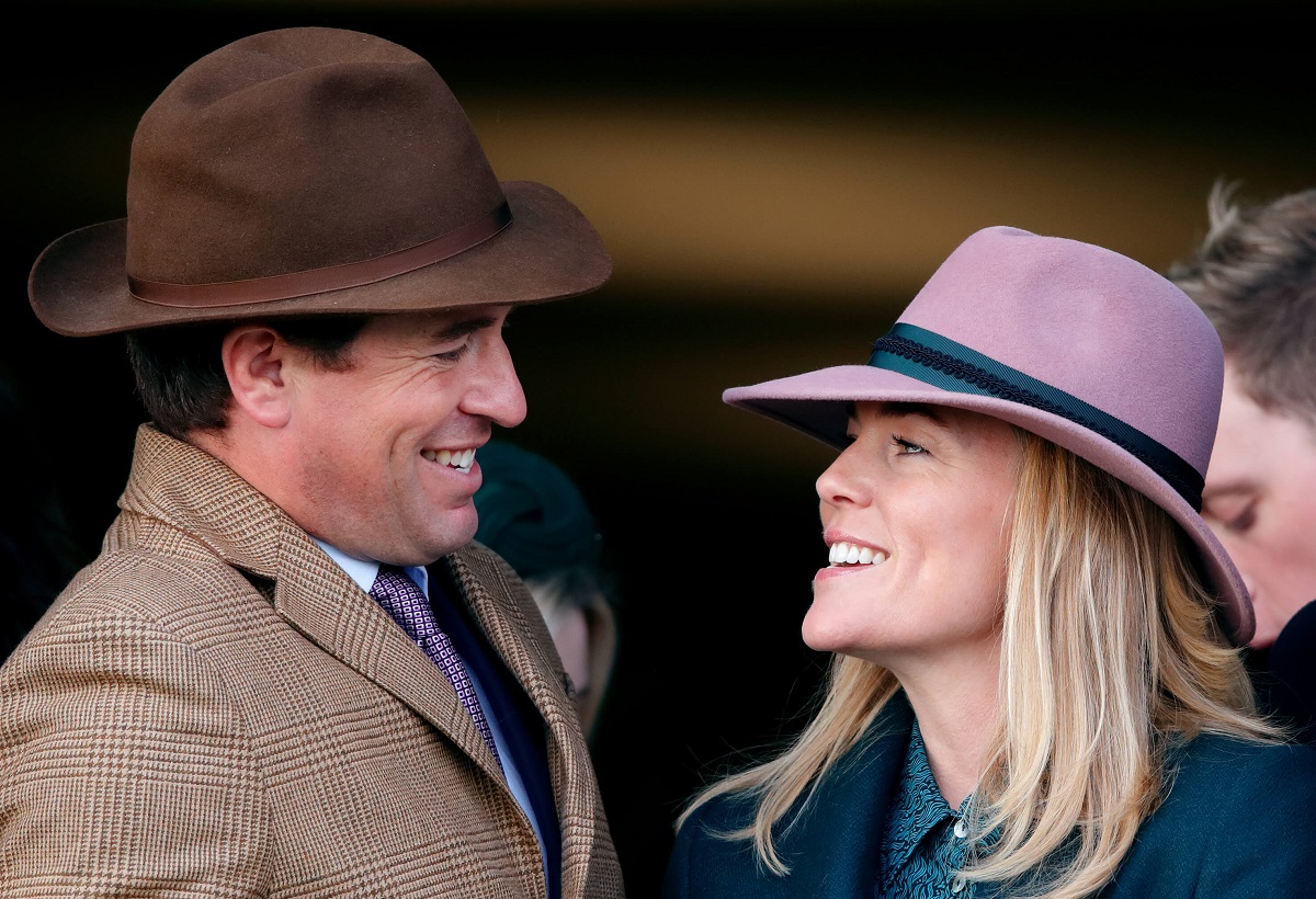 Peter Phillips and Autumn Phillips watch the racing as they attend day 4 'Gold Cup Day'