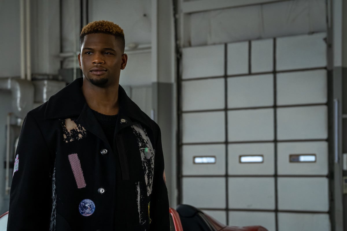 Daniel Bellomy as Zeke Cross wearing a dark jacket with blonde frosted hair in 'Power Book II: Ghost'