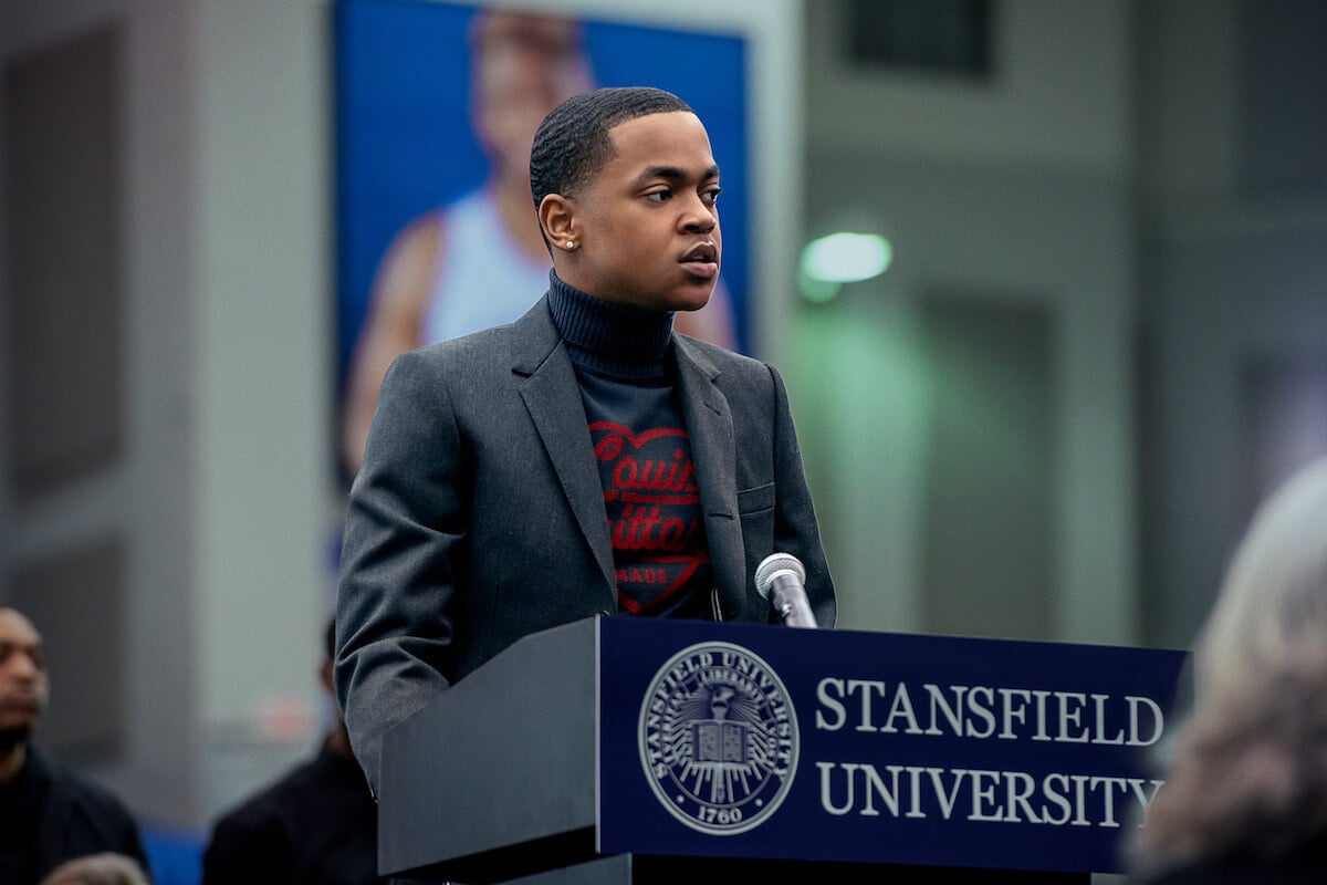 Michael Rainey Jr. as Tariq St. Patrick wearing a blazer and speaking on stage in 'Power Book II: Ghost'