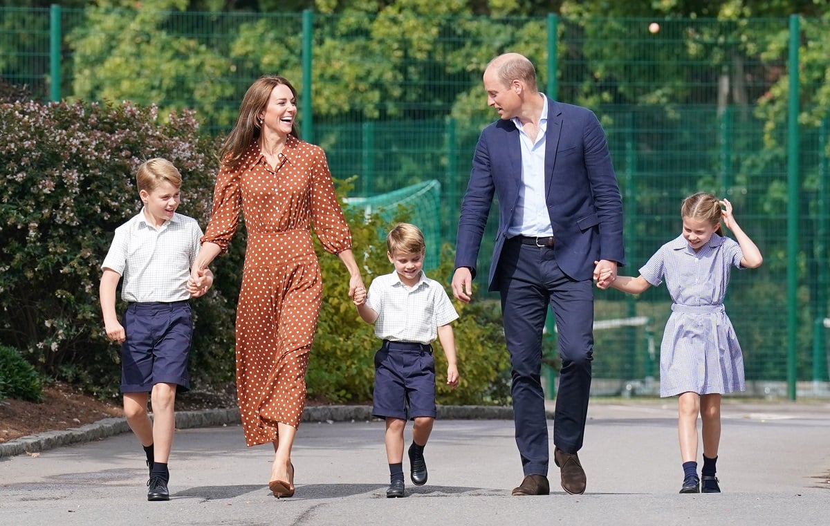 Prince George, Princess Charlotte, and Prince Louis with their parents Prince William and Kate Middleton arriving at Lambrook School