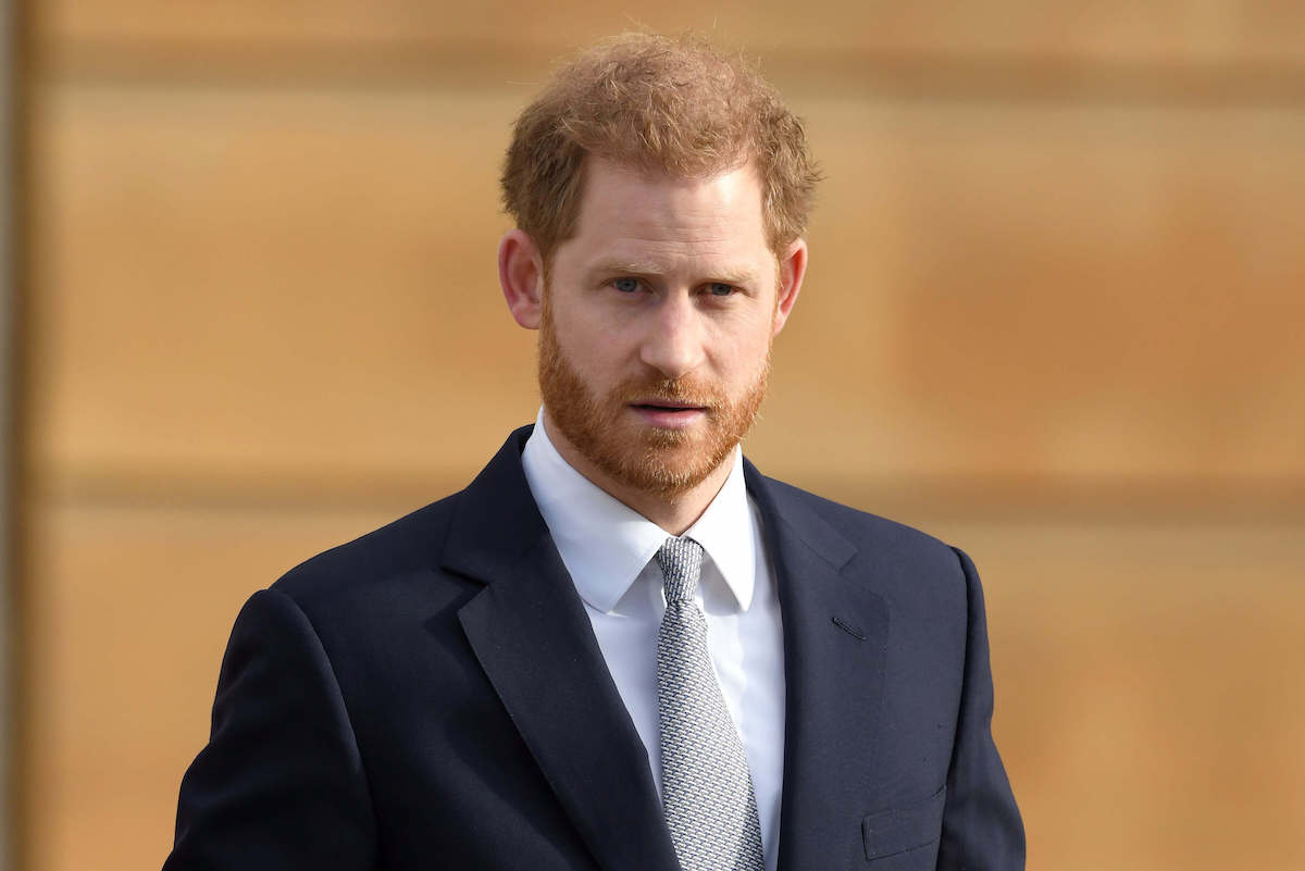 Prince Harry, who is doing a 'Spare' livestream, looks on