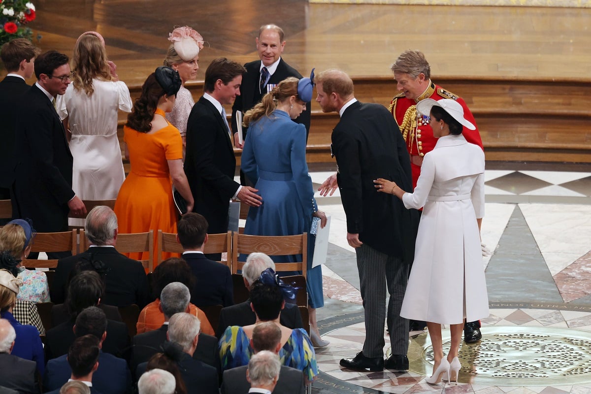 Prince Harry and Meghan Markle arrive at the National Service of Thanksgiving to sit in second row with non-working royals